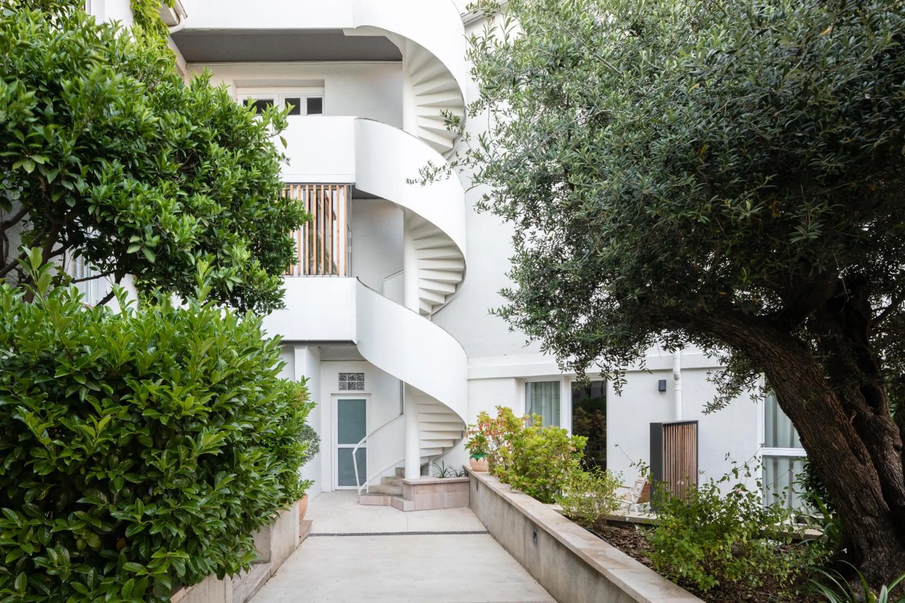Garden in Les Elmes - Hôtel & Spa
