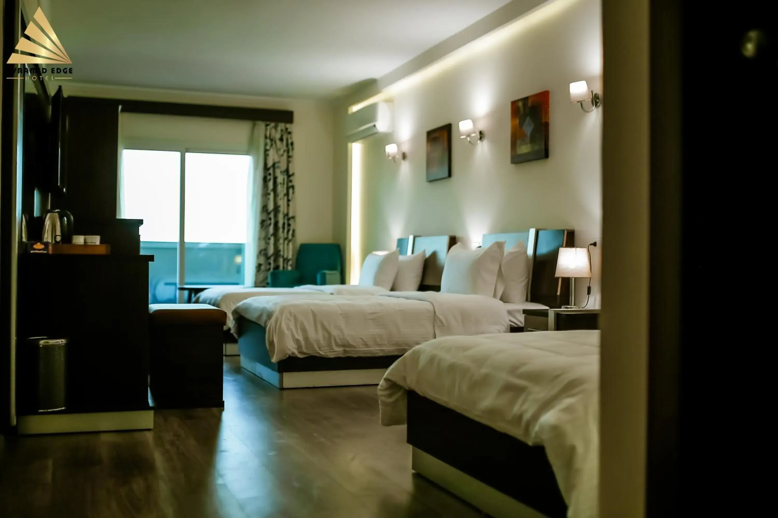 Deluxe Triple Room Pyramids View & Balcony in Pyramid Edge Hotel & Exclusive Pyramids View Rooftop Deluxe Triple Room Pyramids View & Balcony in Pyramid Edge Hotel & Exclusive Pyramids View Rooftop