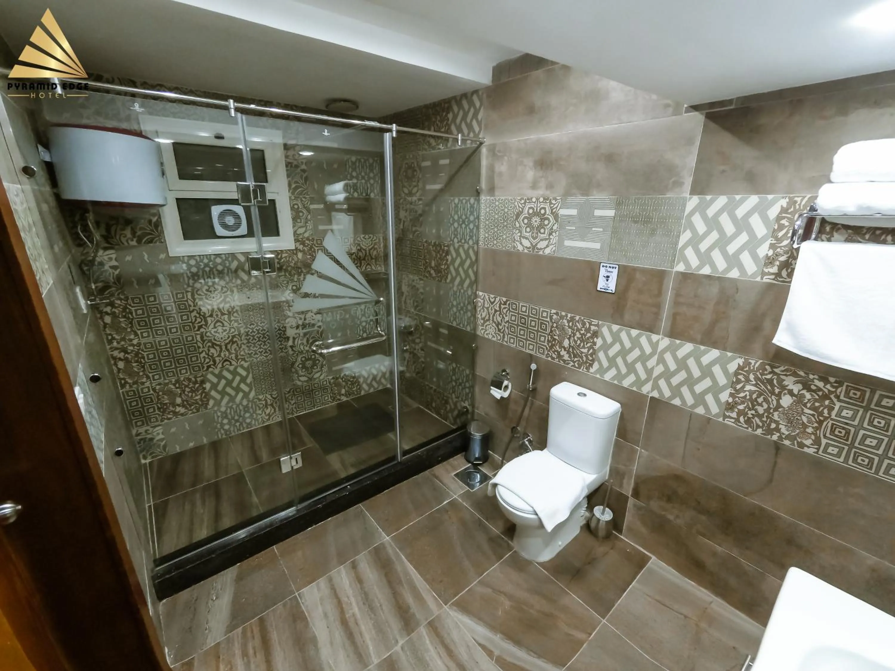 Shower in Pyramid Edge Hotel & Exclusive Pyramids View Rooftop