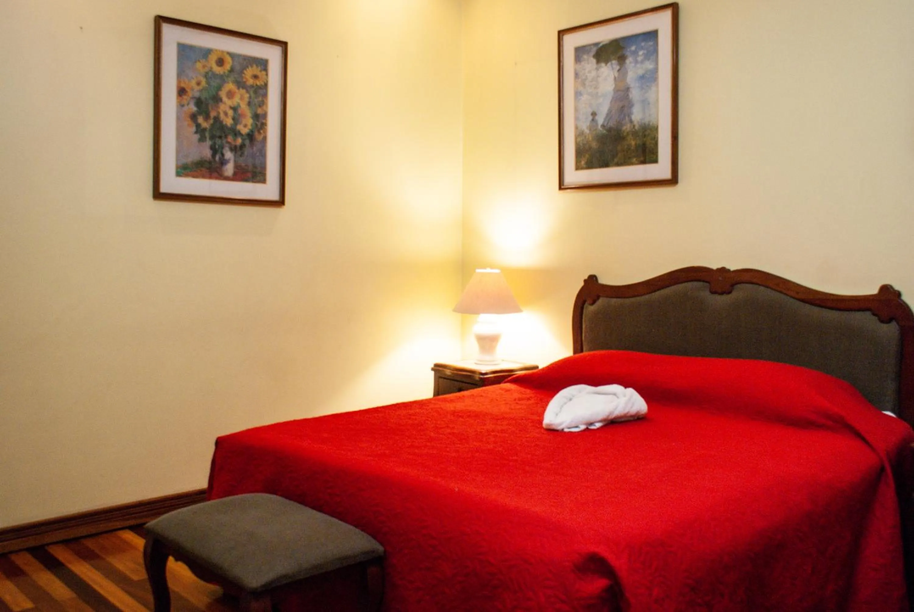 Bed in La Bergerac Boutique Hotel