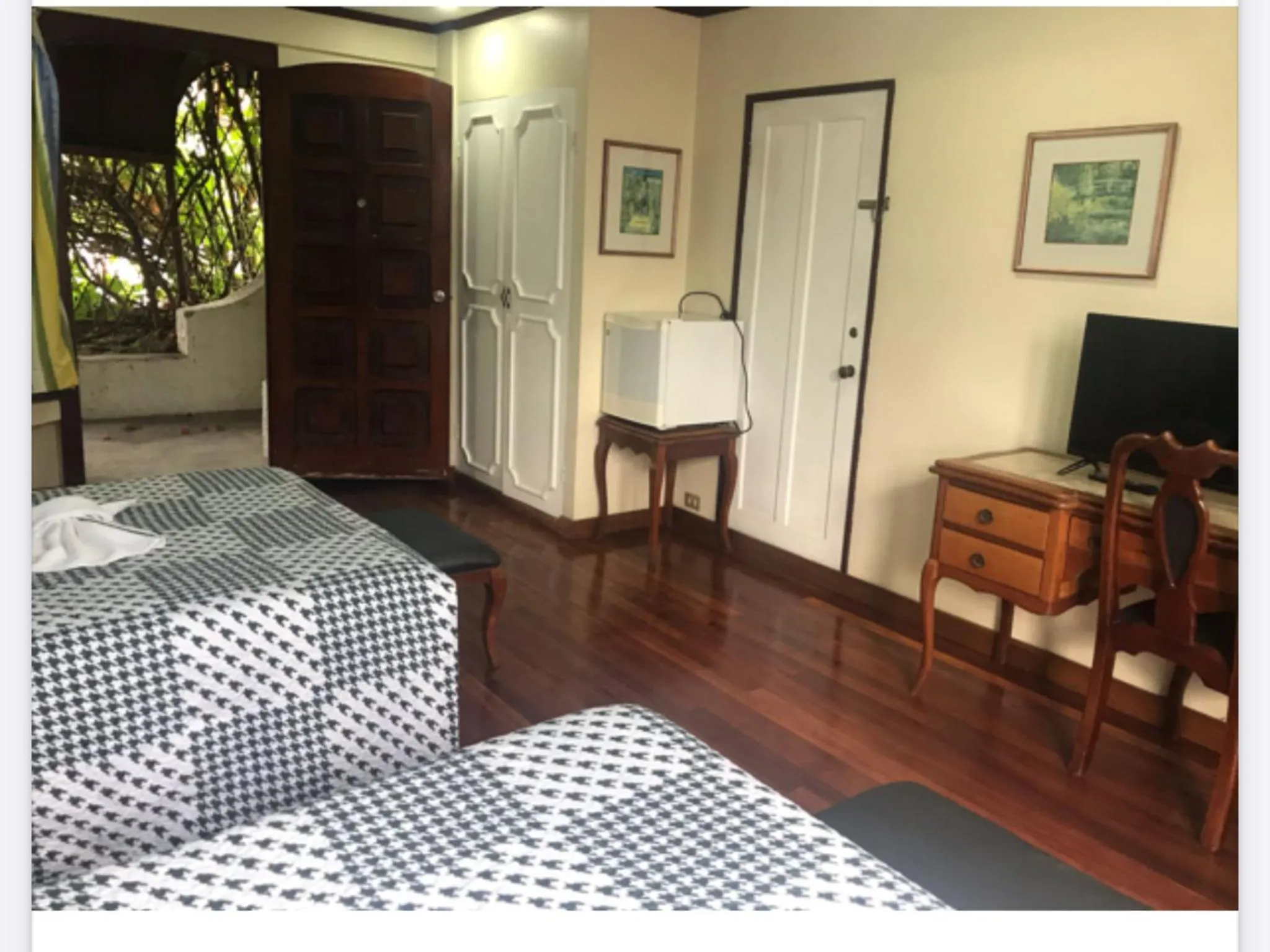 Bed in La Bergerac Boutique Hotel