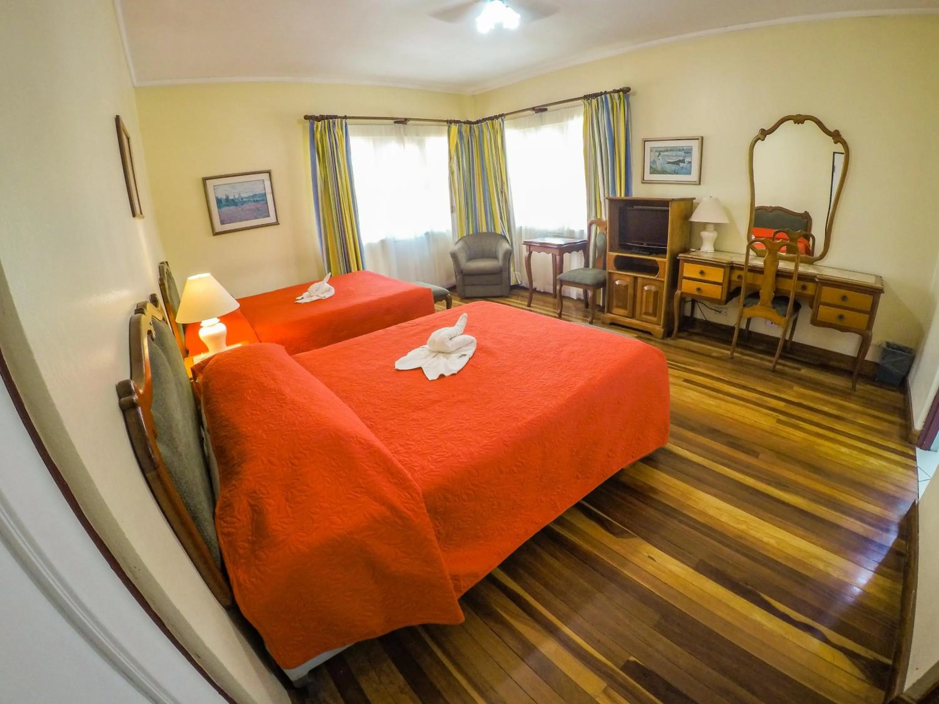 Bed in La Bergerac Boutique Hotel