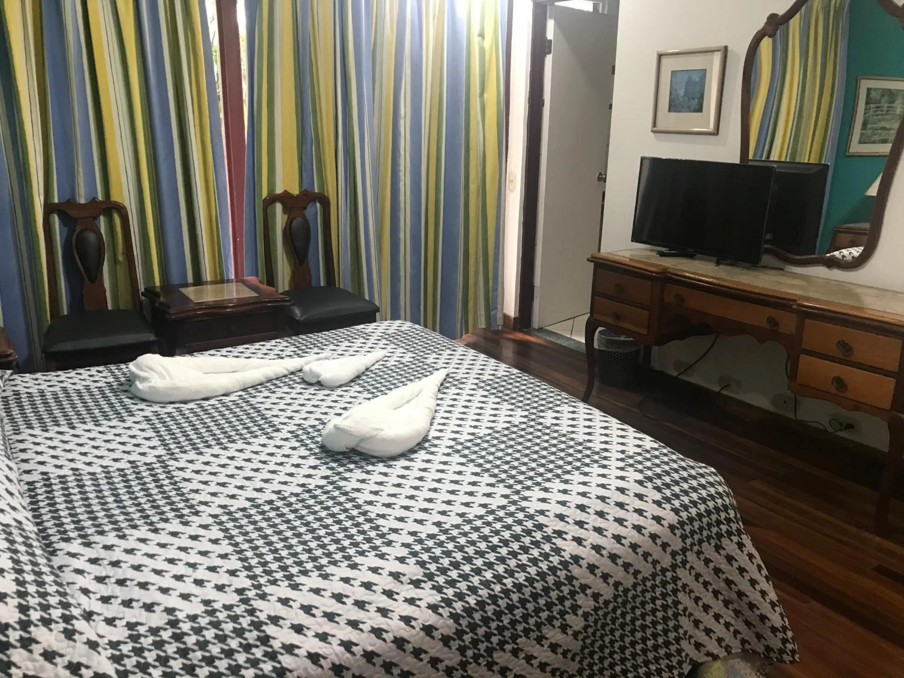 Bed in La Bergerac Boutique Hotel