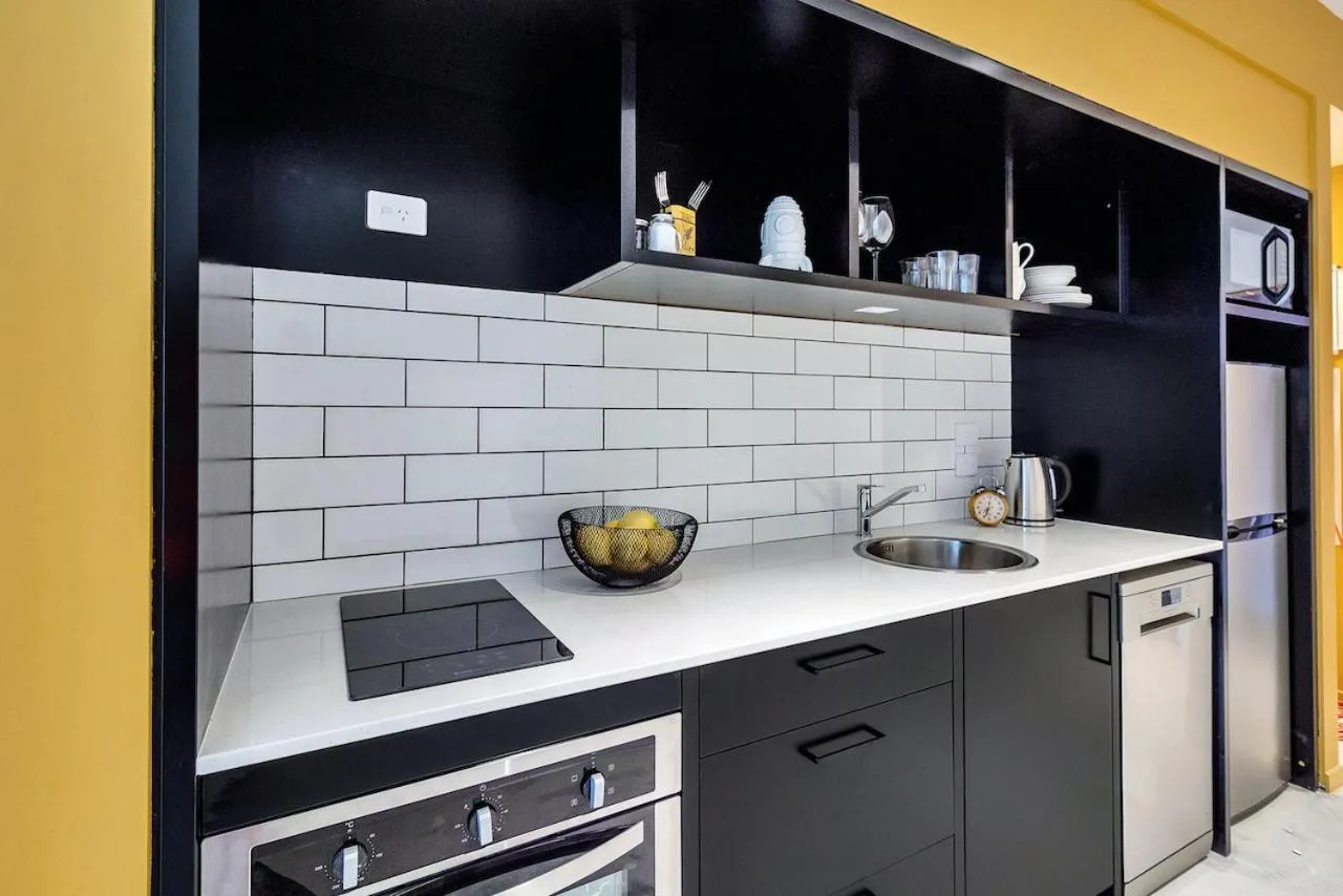 Kitchen or kitchenette in Roomie Apartment Hotel