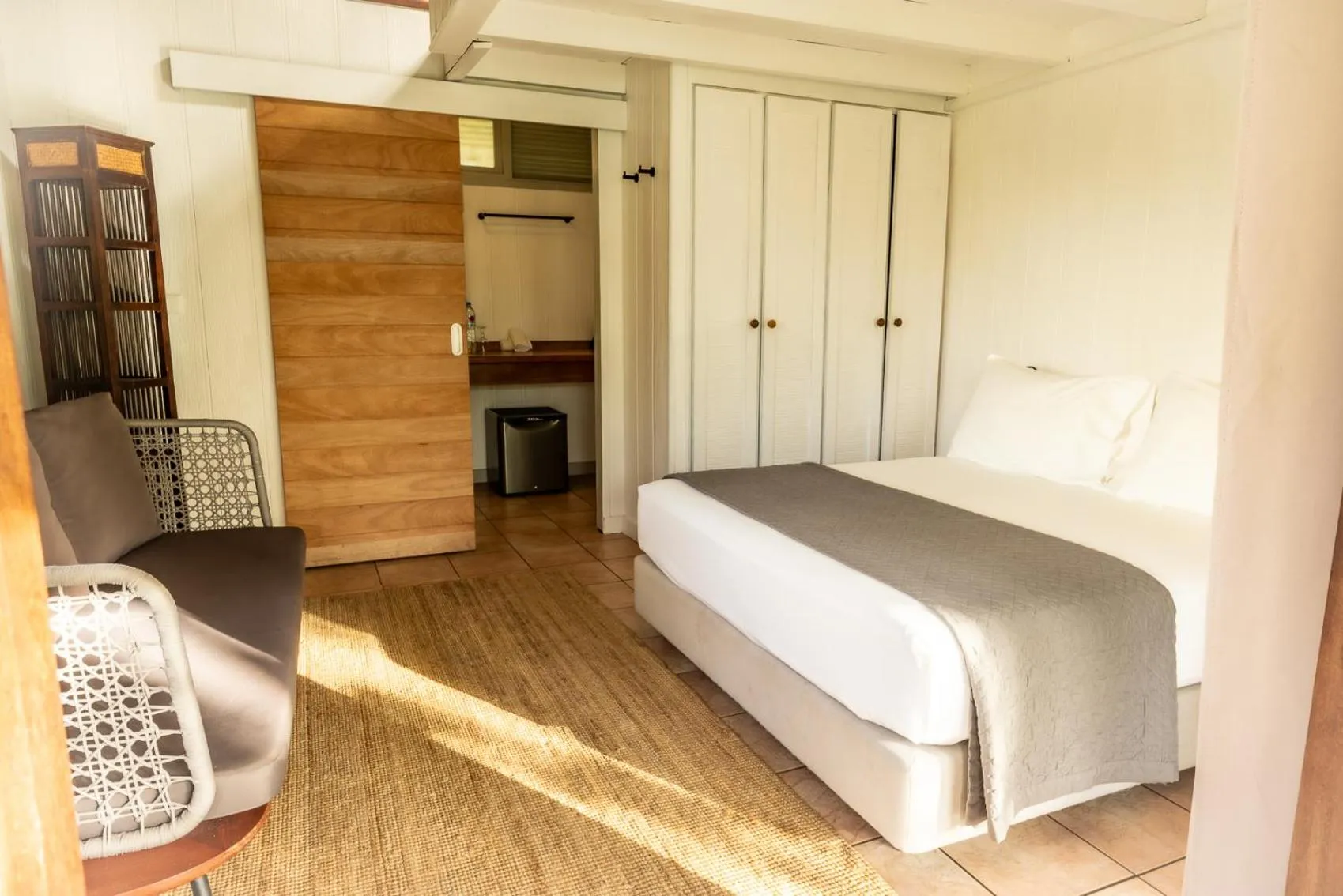 Bed in Moorea Island Beach Hotel