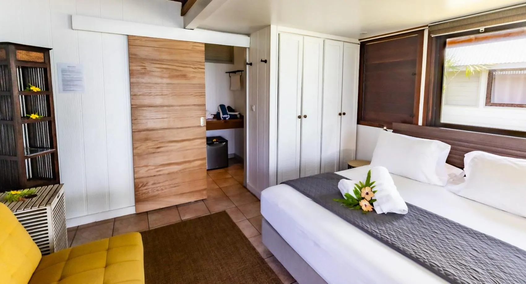 Bed in Moorea Island Beach Hotel