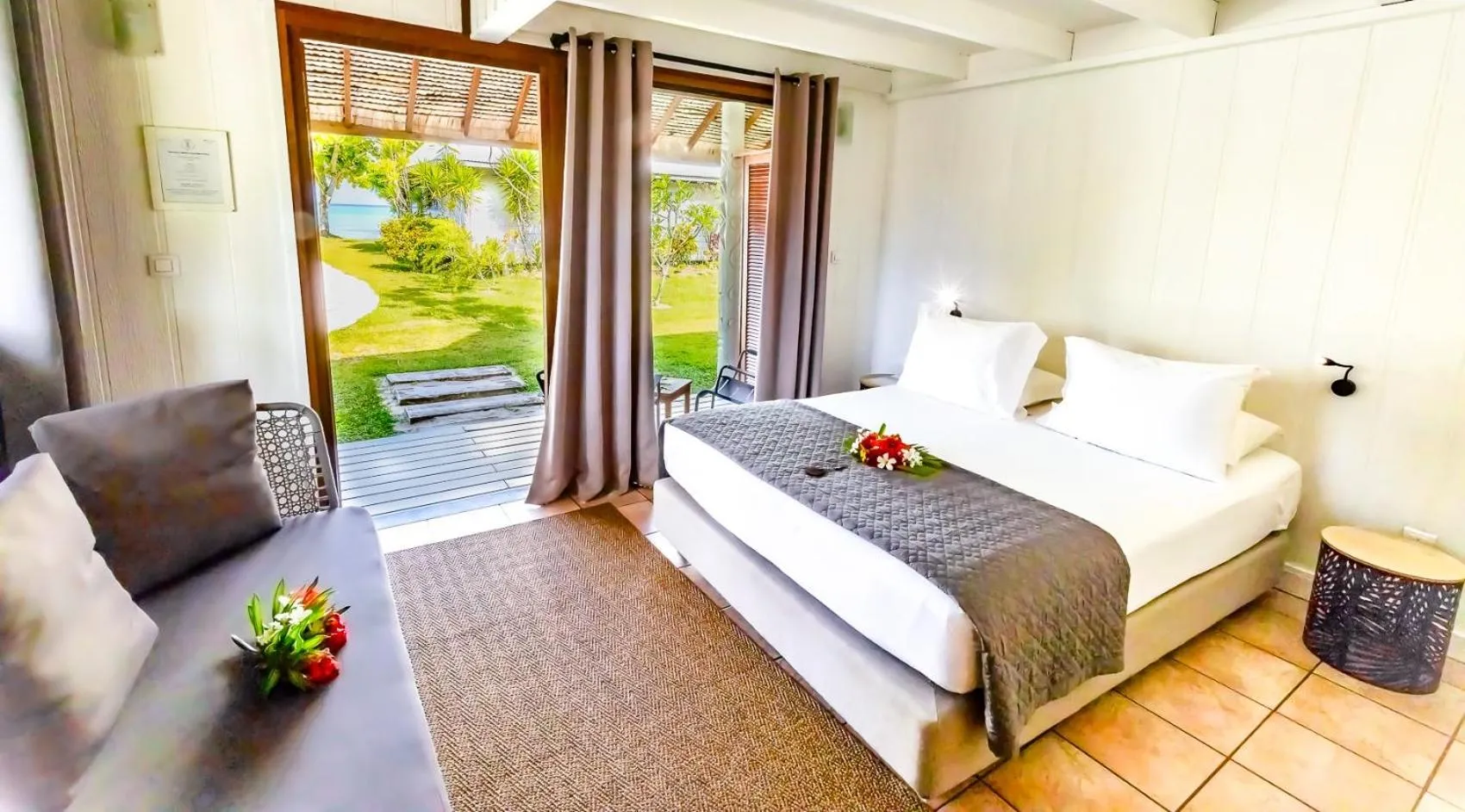 Bed in Moorea Island Beach Hotel