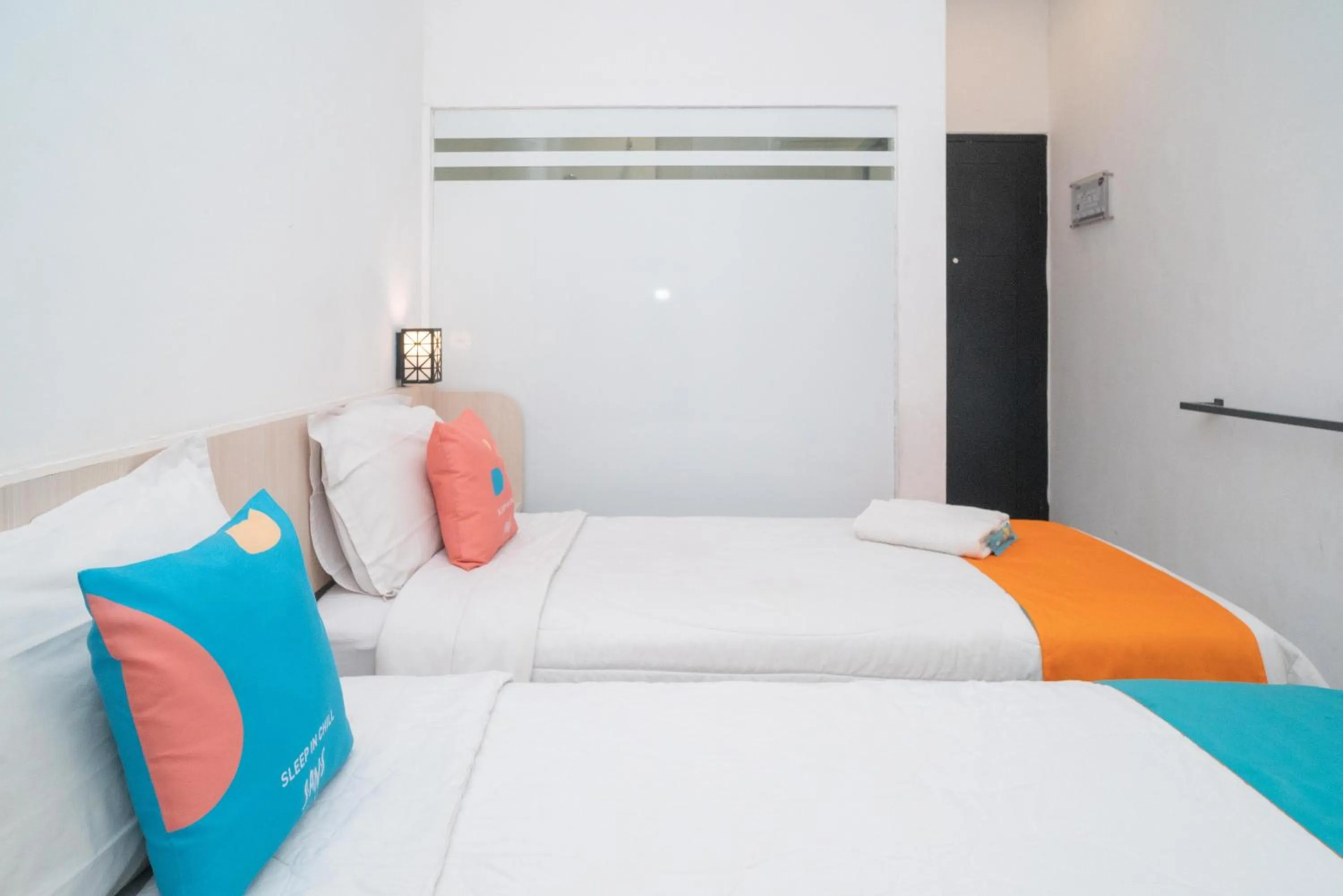 Bedroom, Bed in Sans Hotel FiFFa Premiere Malang