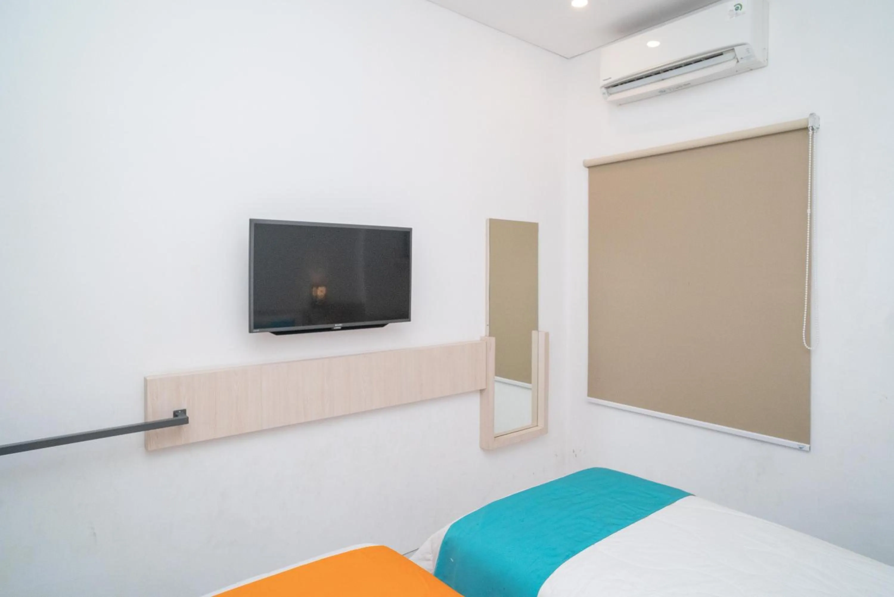 Bedroom, Bed in Sans Hotel FiFFa Premiere Malang