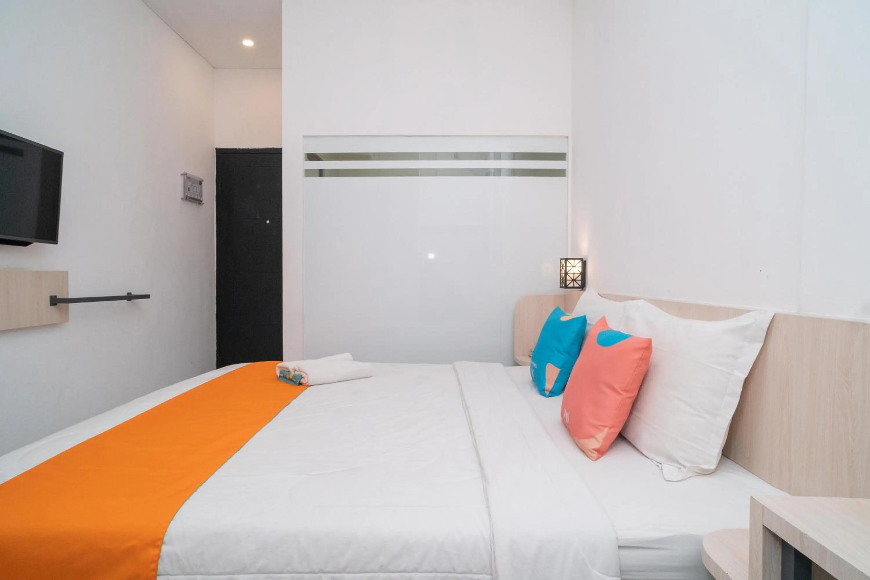 Bedroom, Bed in Sans Hotel FiFFa Premiere Malang