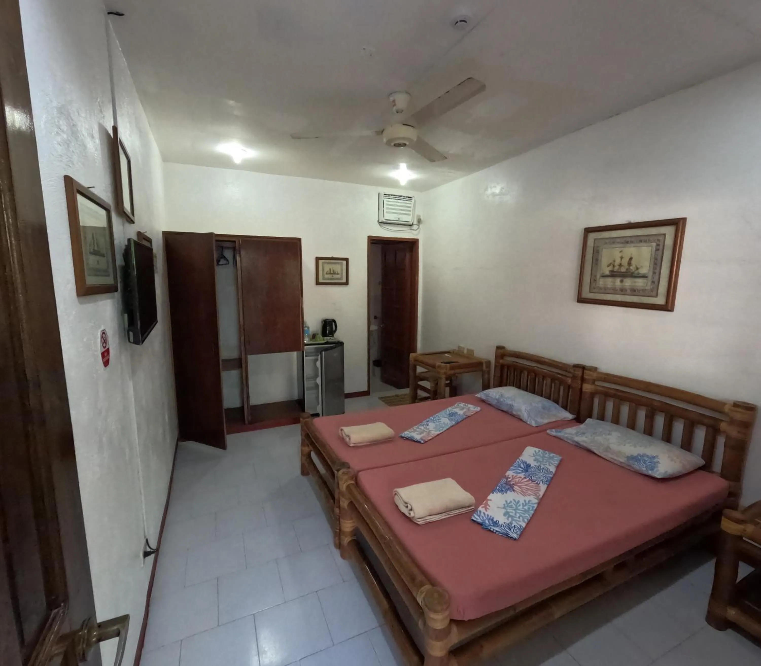 Photo of the whole room, Bed in Marina Village