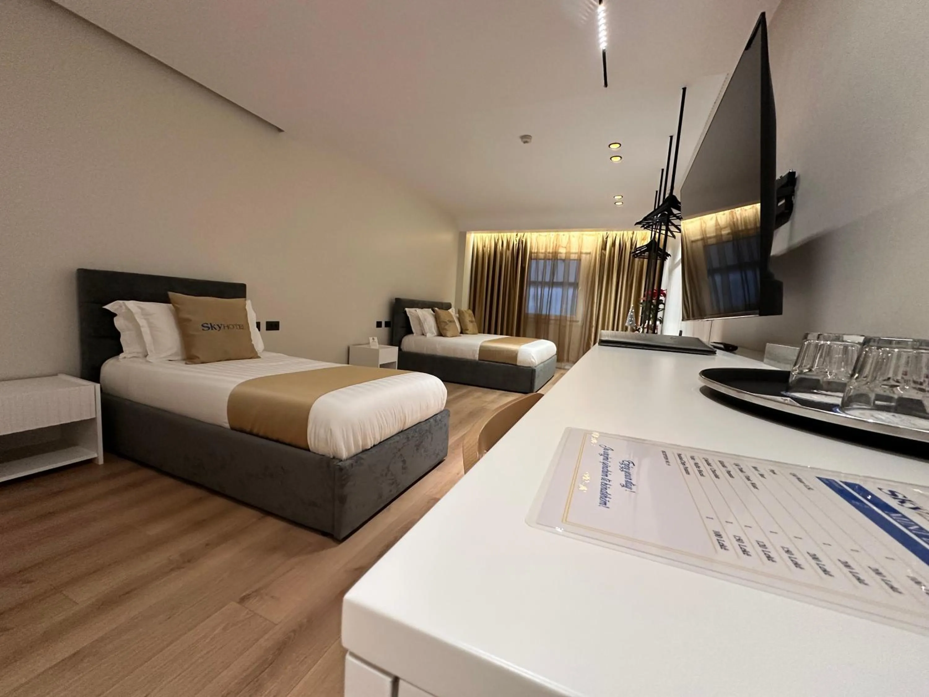 Communal lounge/ TV room, Bed in Sky 2 Hotel Tirana