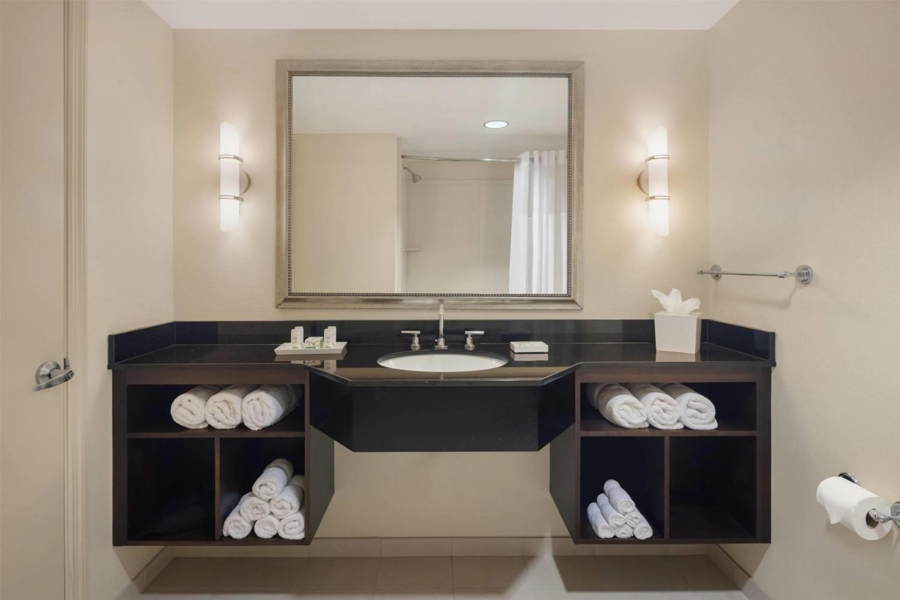 Bathroom in Ramada Plaza by Wyndham Orlando Resort & Suites Intl Drive - Newly Renovated!