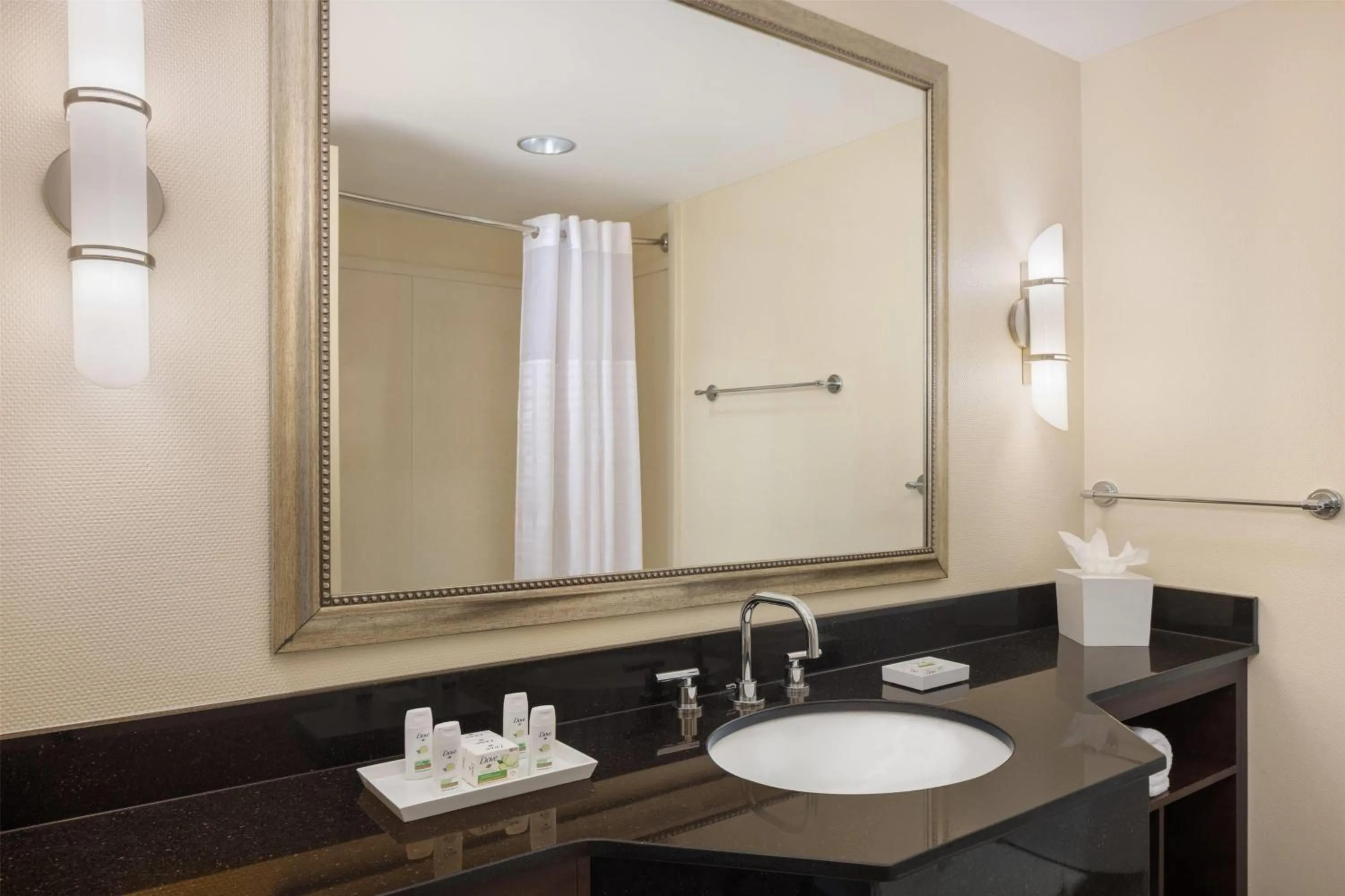 Bathroom in Ramada Plaza by Wyndham Orlando Resort & Suites Intl Drive - Newly Renovated!