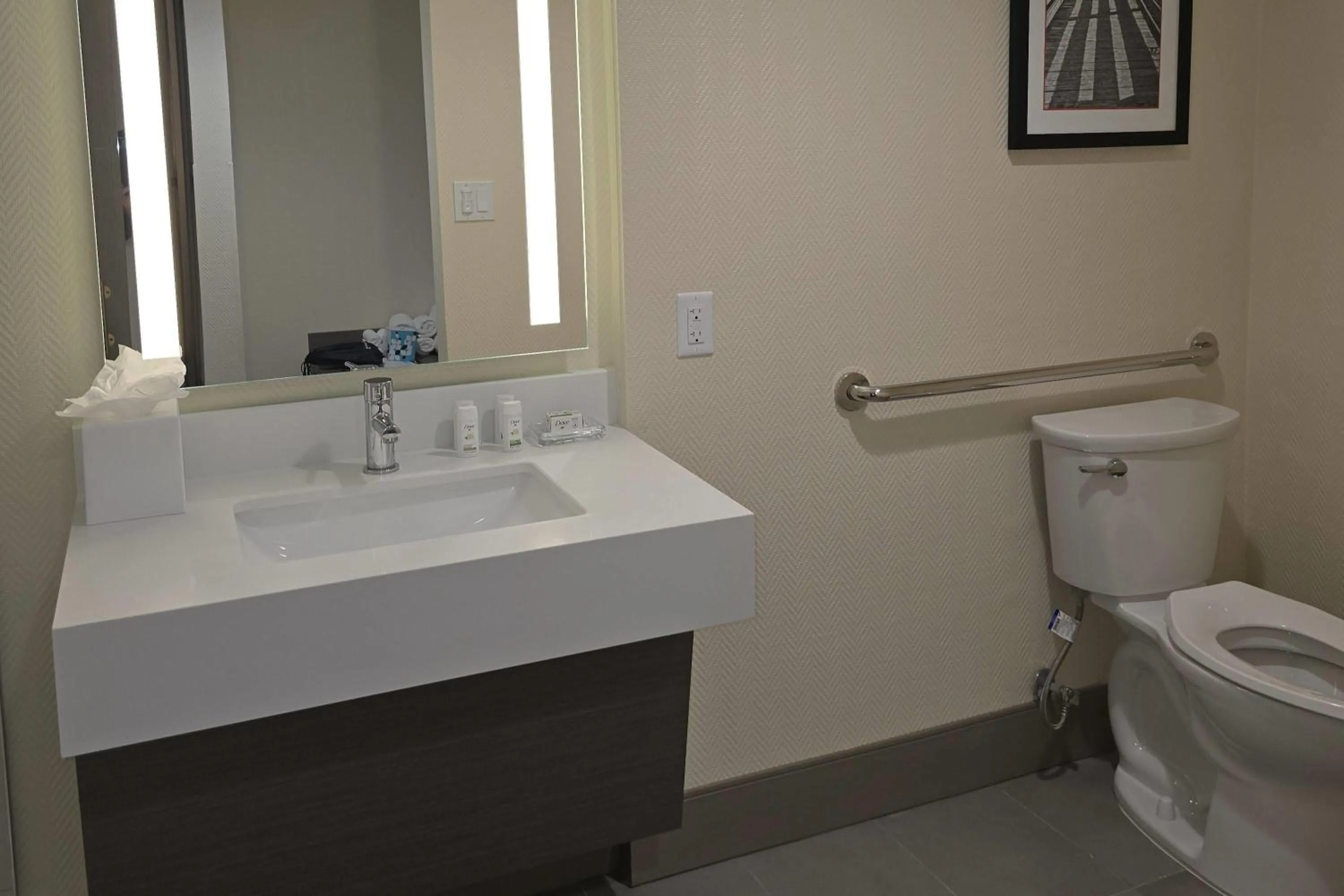Bathroom in Ramada Plaza by Wyndham Orlando Resort & Suites Intl Drive - Newly Renovated!