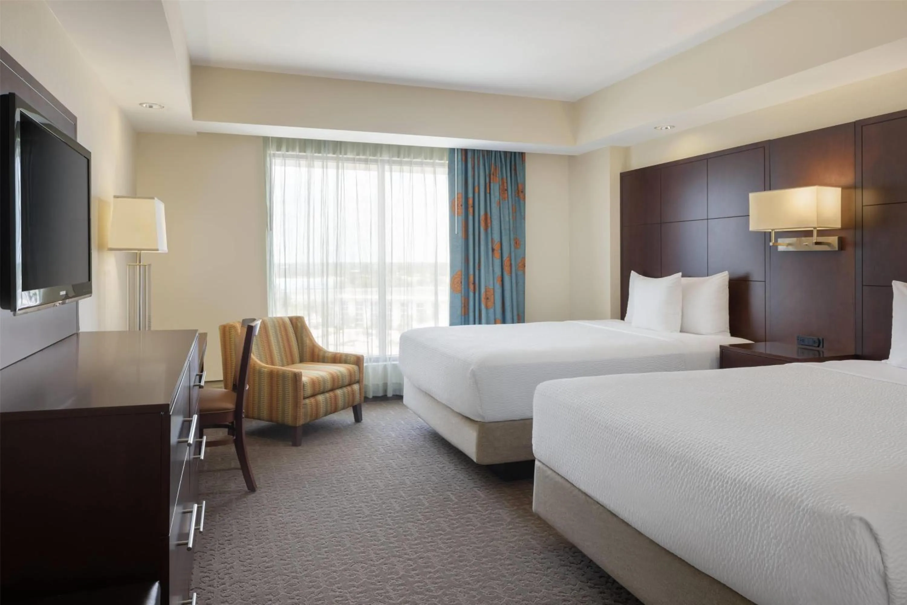 Photo of the whole room, Bed in Ramada Plaza by Wyndham Orlando Resort & Suites Intl Drive - Newly Renovated!
