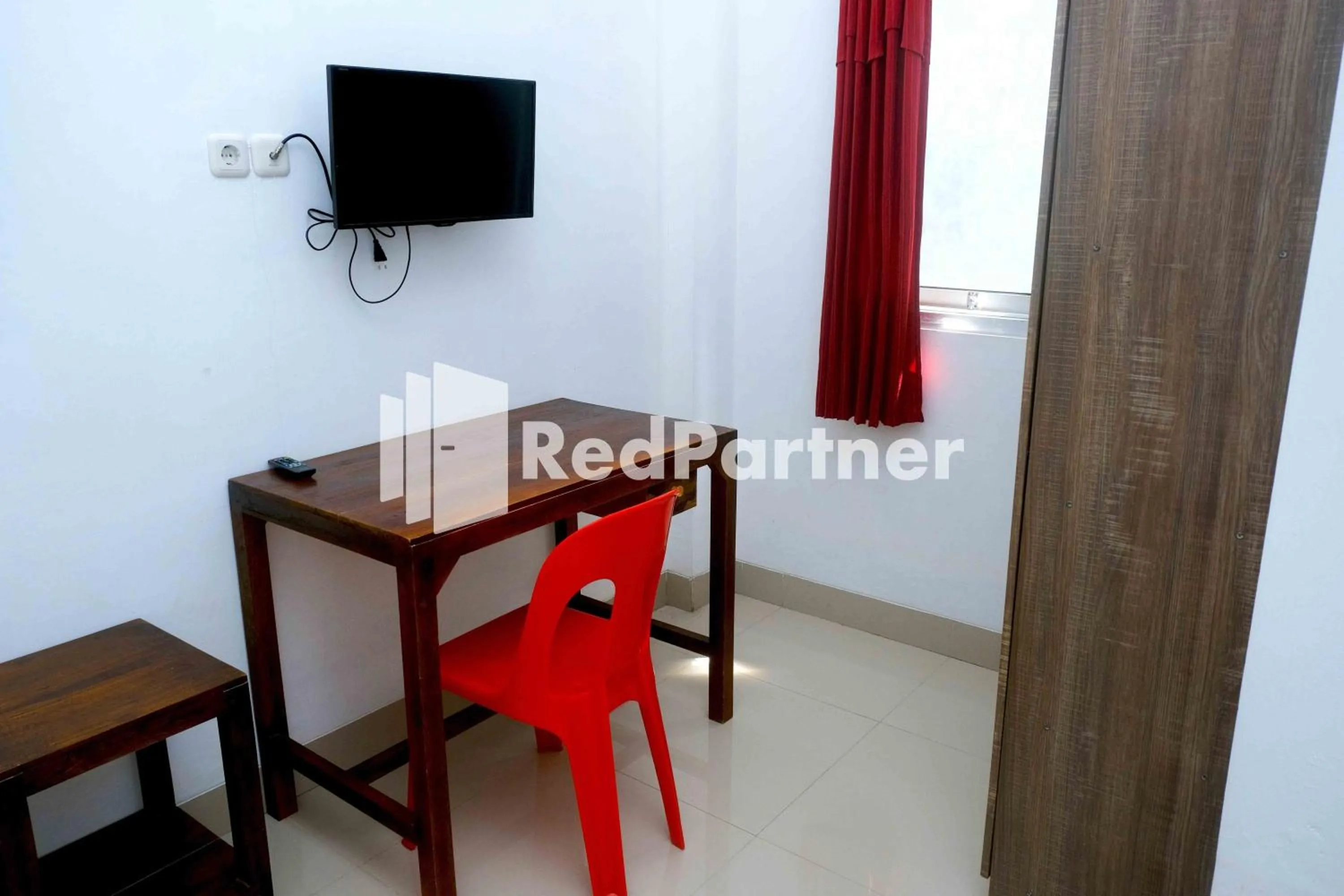 Bedroom in Fortuner Homestay Syariah Makassar Mitra RedDoorz