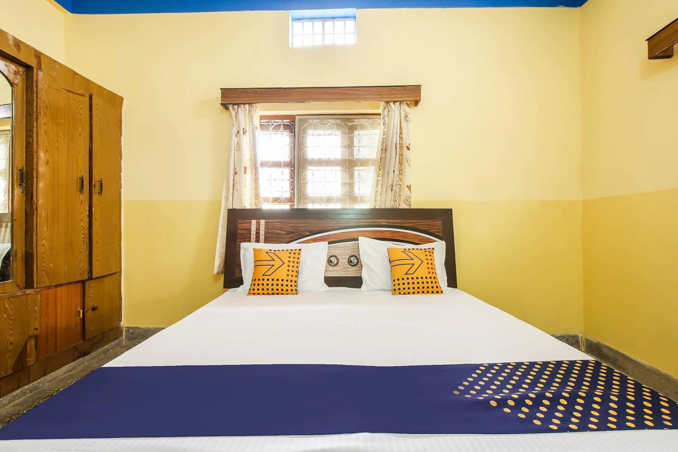 Bedroom in SPOT ON Cherish Guest House