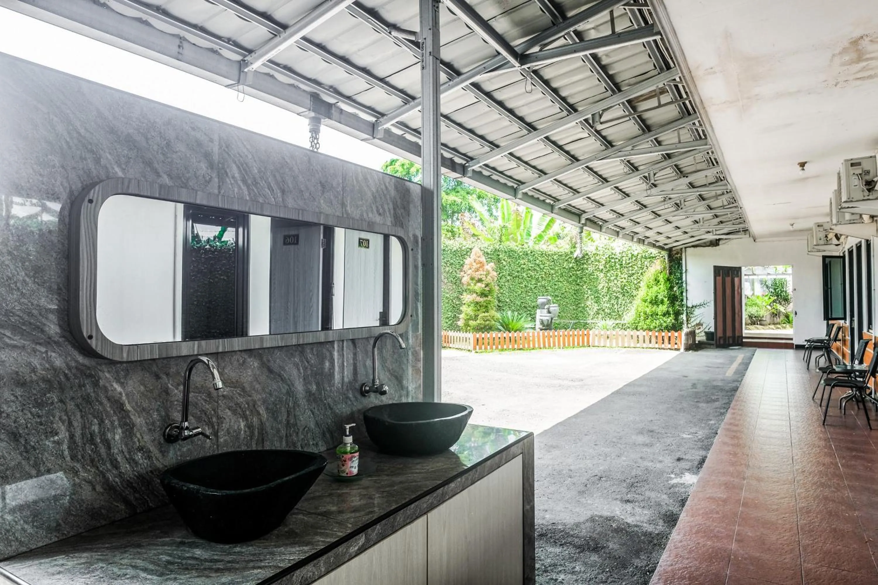 Property building in RedDoorz near GOR Satria 3