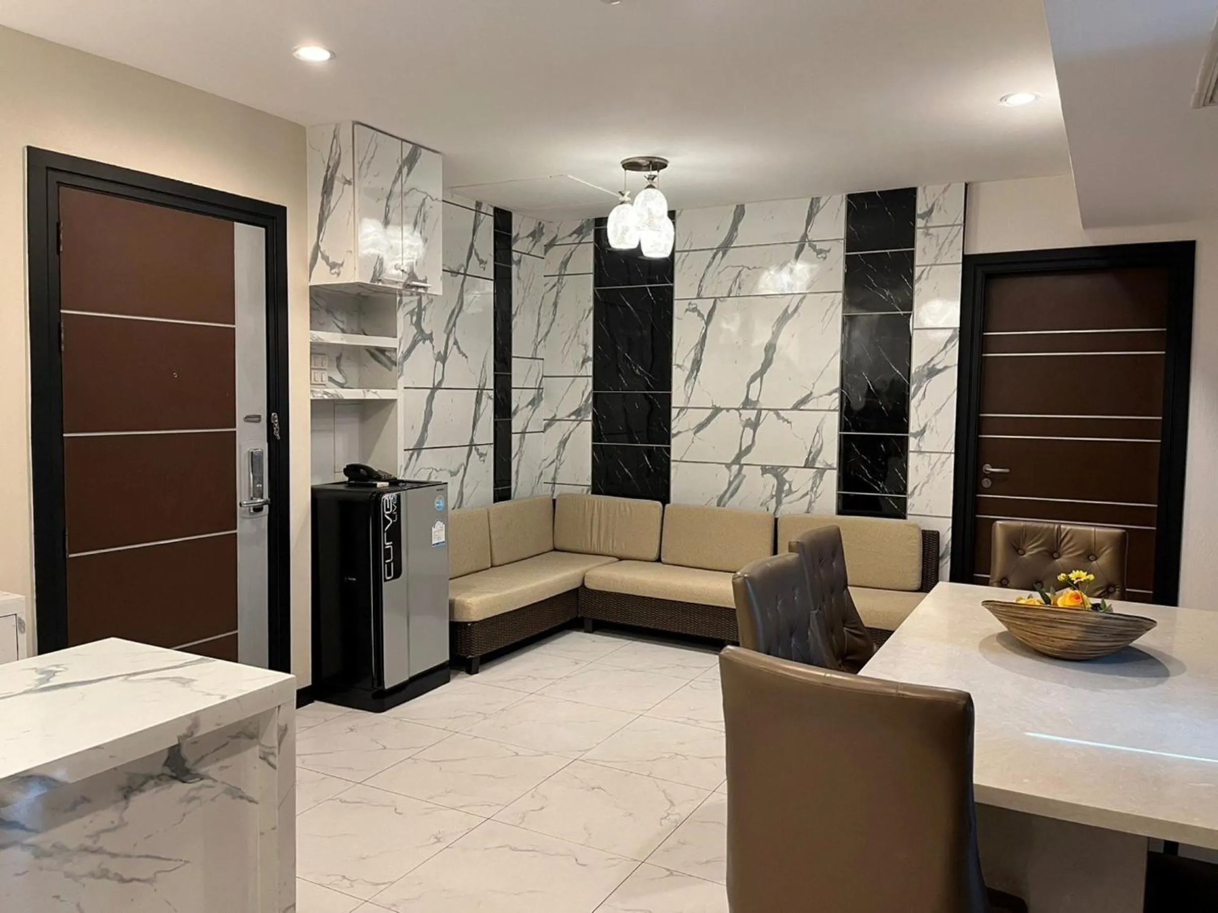 Living room in Sky dome resotel - โรงแรมสกายโดม รีโซเทล