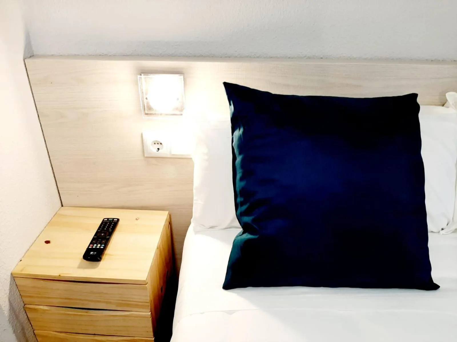 Decorative detail, Bed in Hostal Lucia by gaiarooms