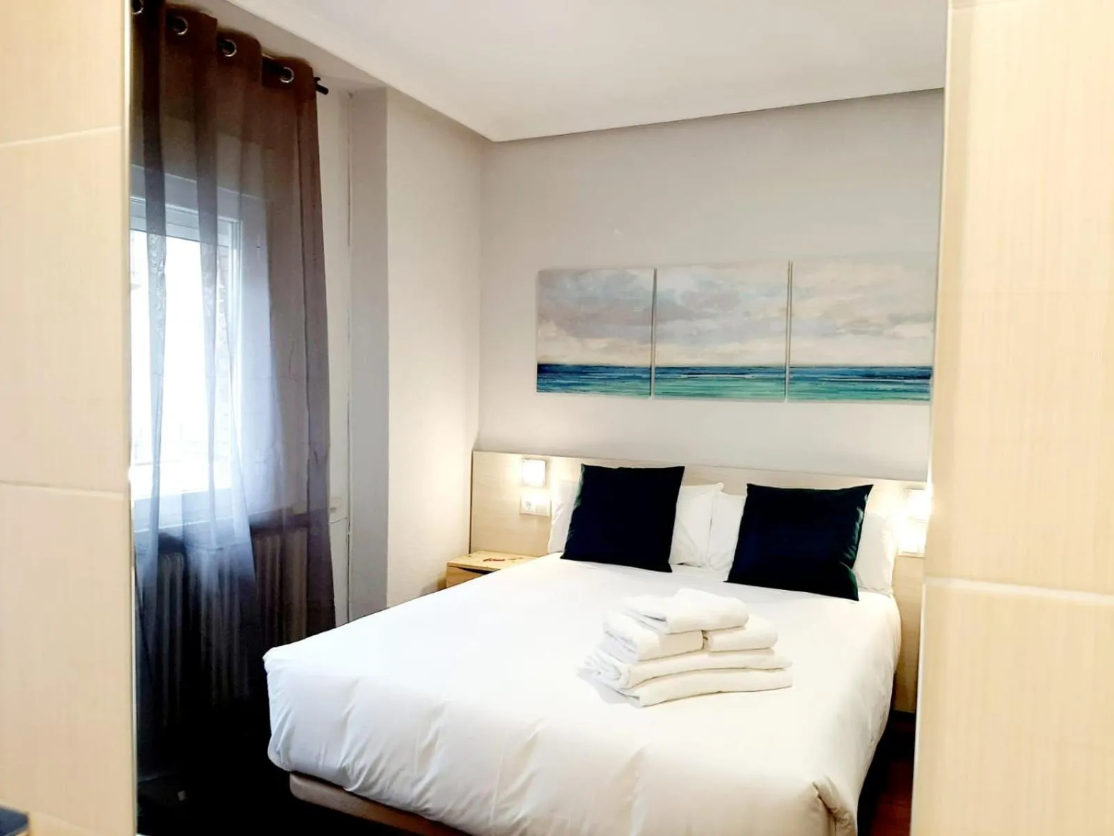 Bed in Hostal Lucia by gaiarooms