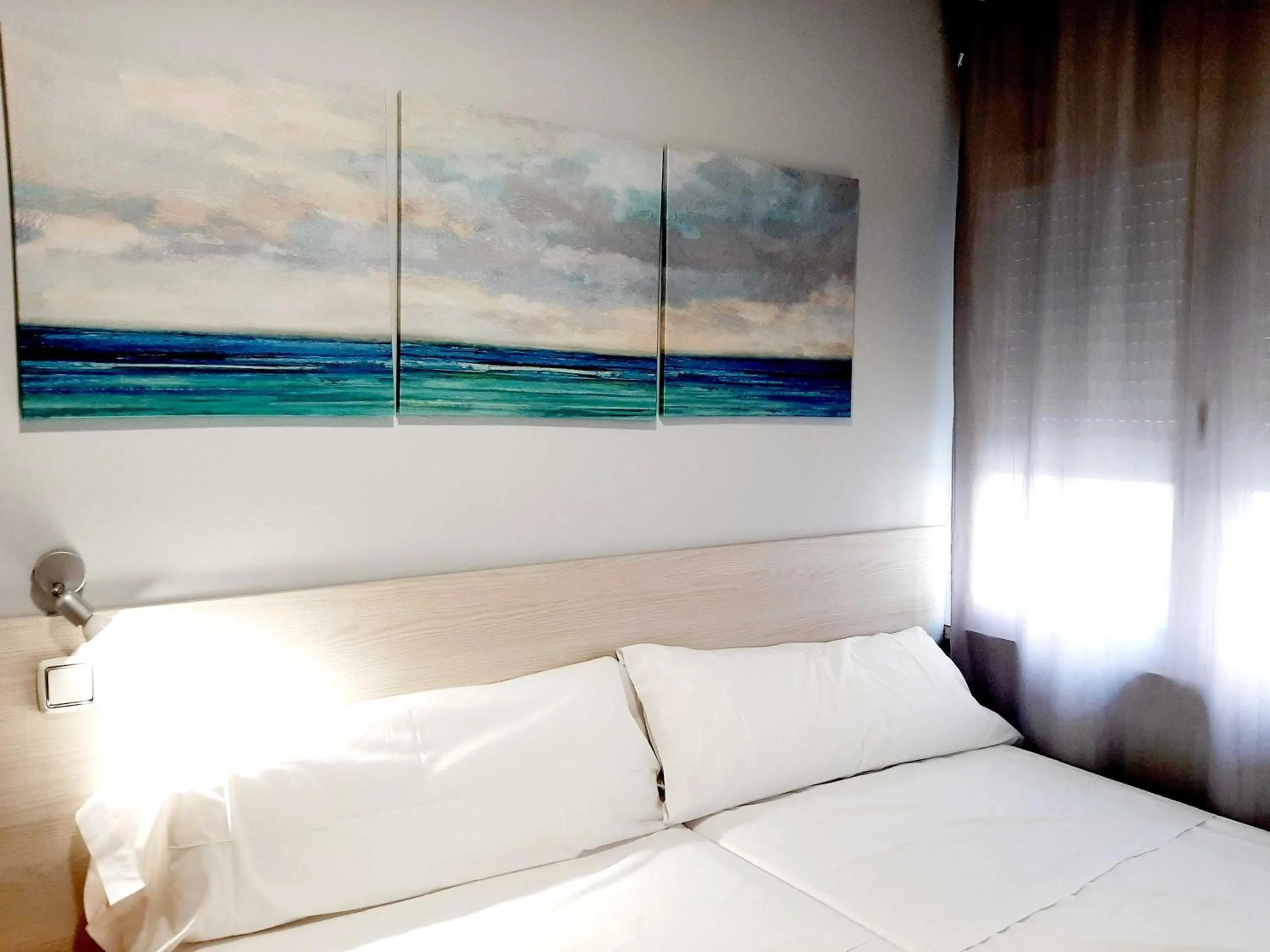 Bed in Hostal Lucia by gaiarooms