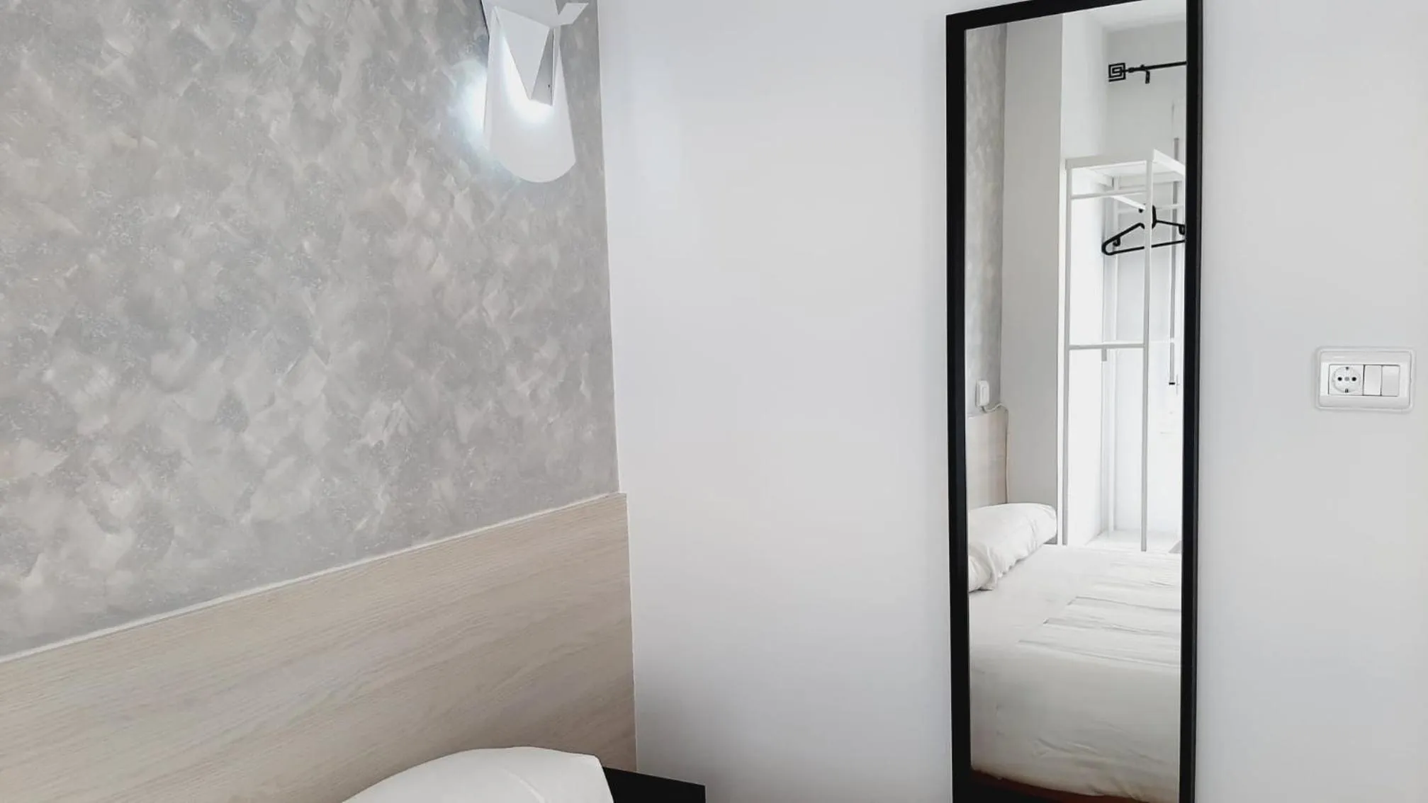 Bed in Hostal Lucia by gaiarooms