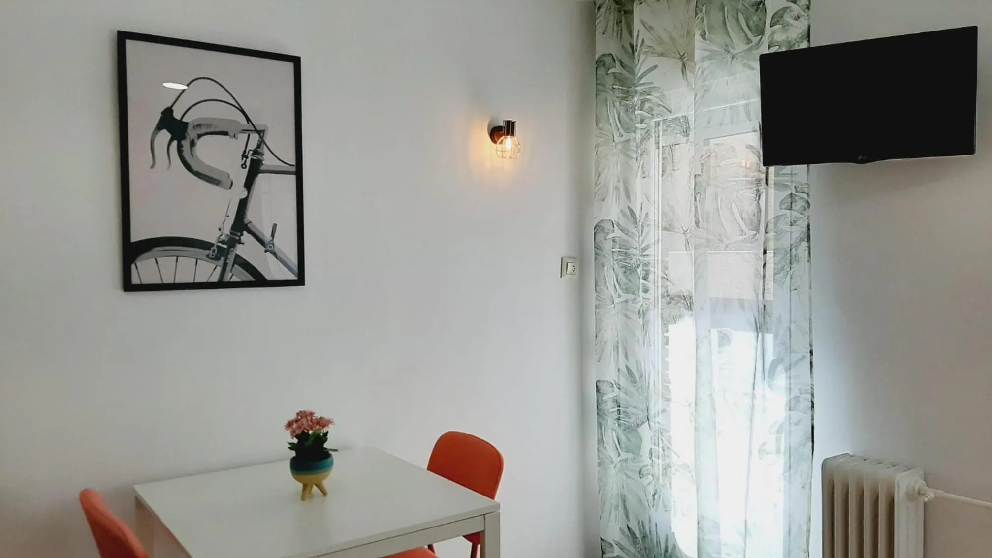 Living room in Hostal Lucia by gaiarooms