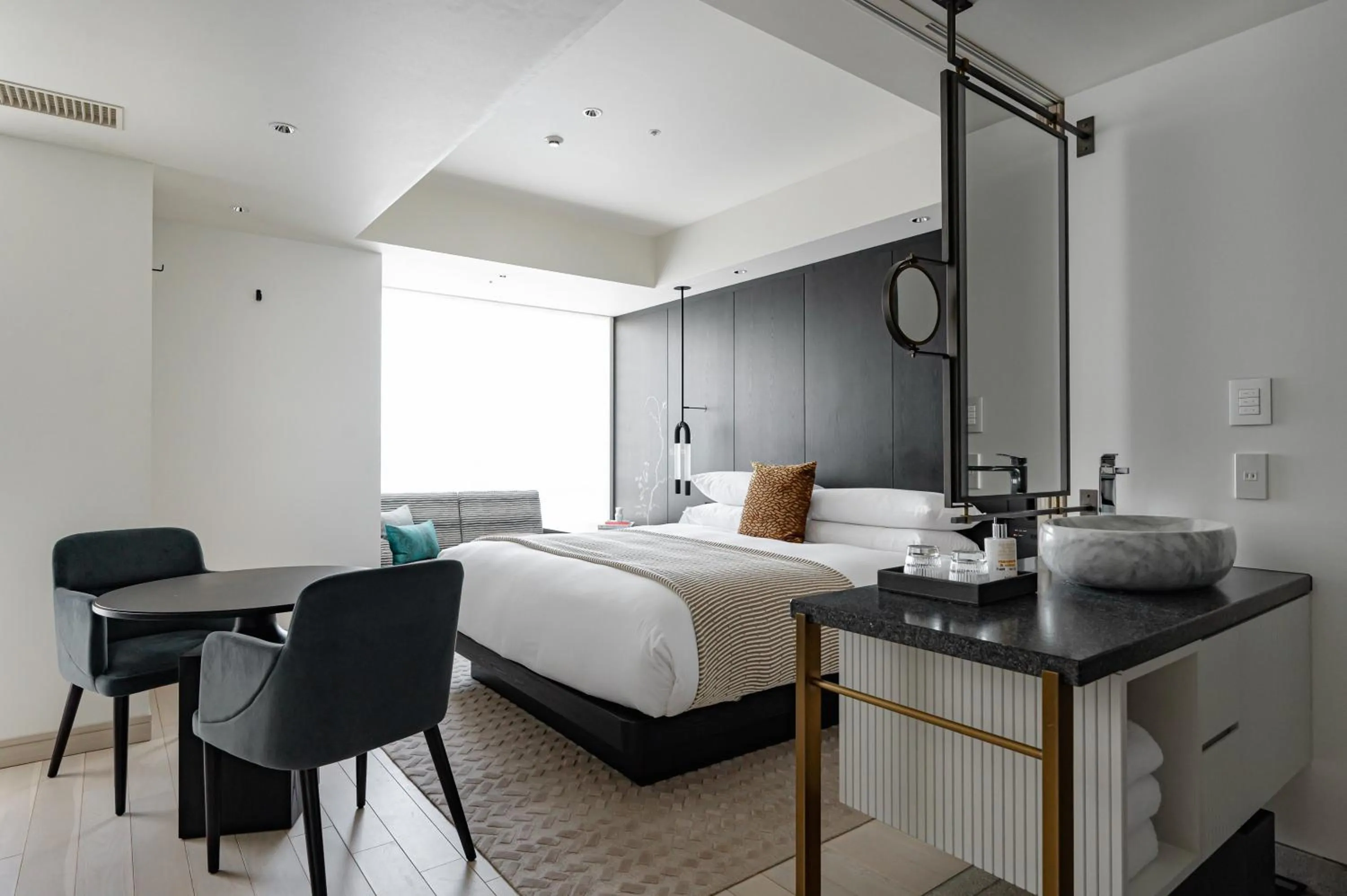 Photo of the whole room, Bed in Kimpton Shinjuku Tokyo by IHG