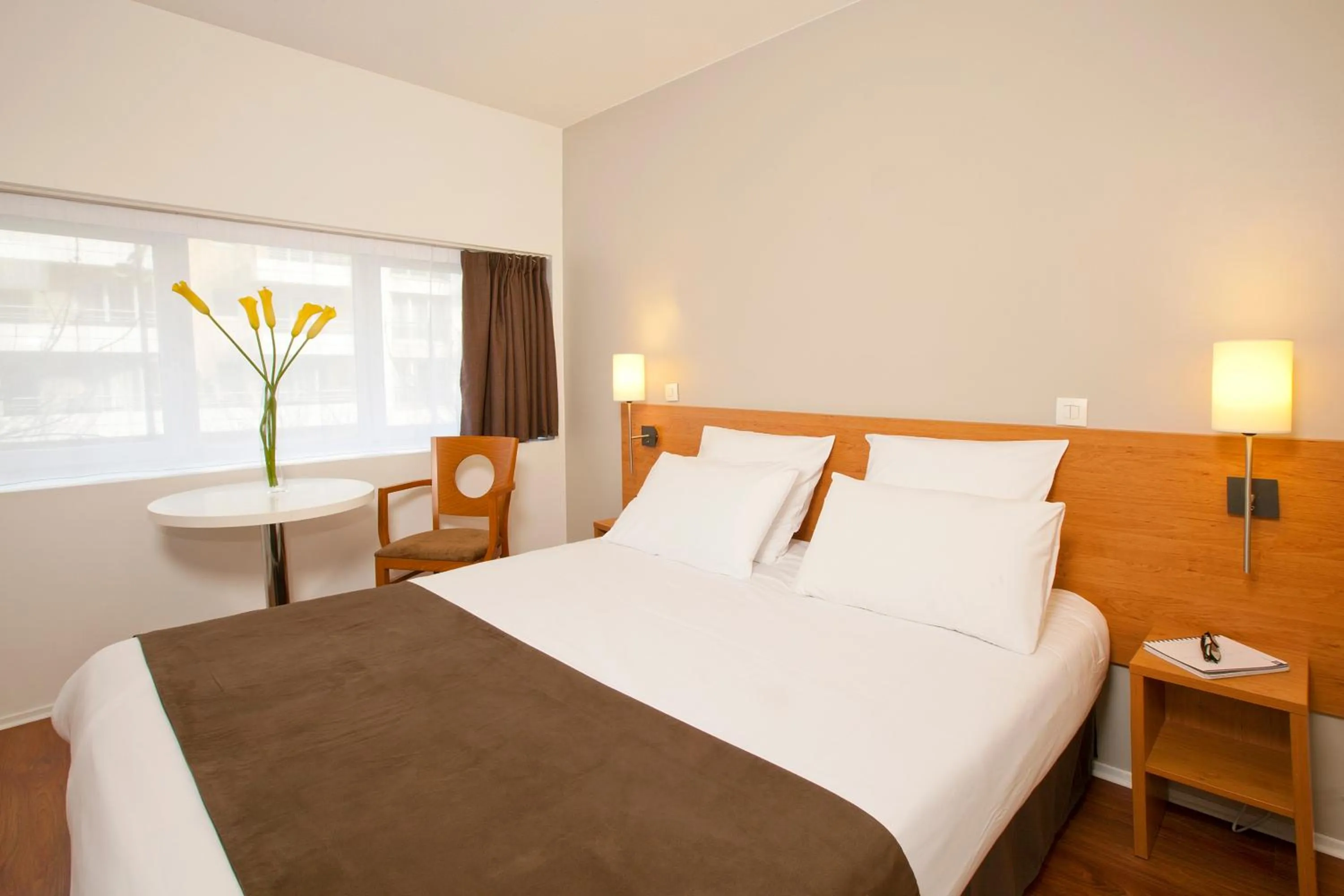 Bedroom, Bed in Séjours & Affaires Courbevoie Grande Arche