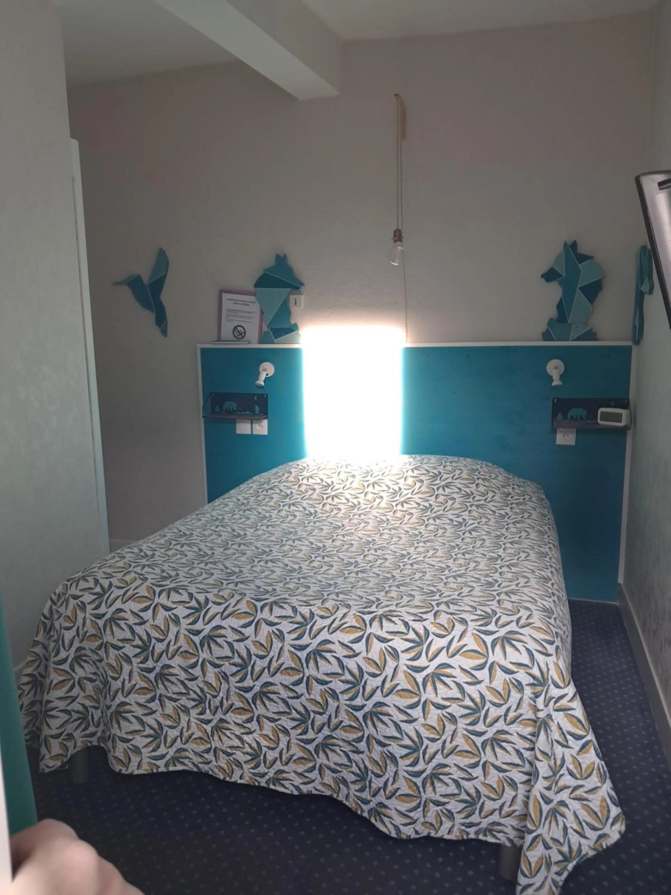 Bed in Hôtel Confort 09 ou HC-09