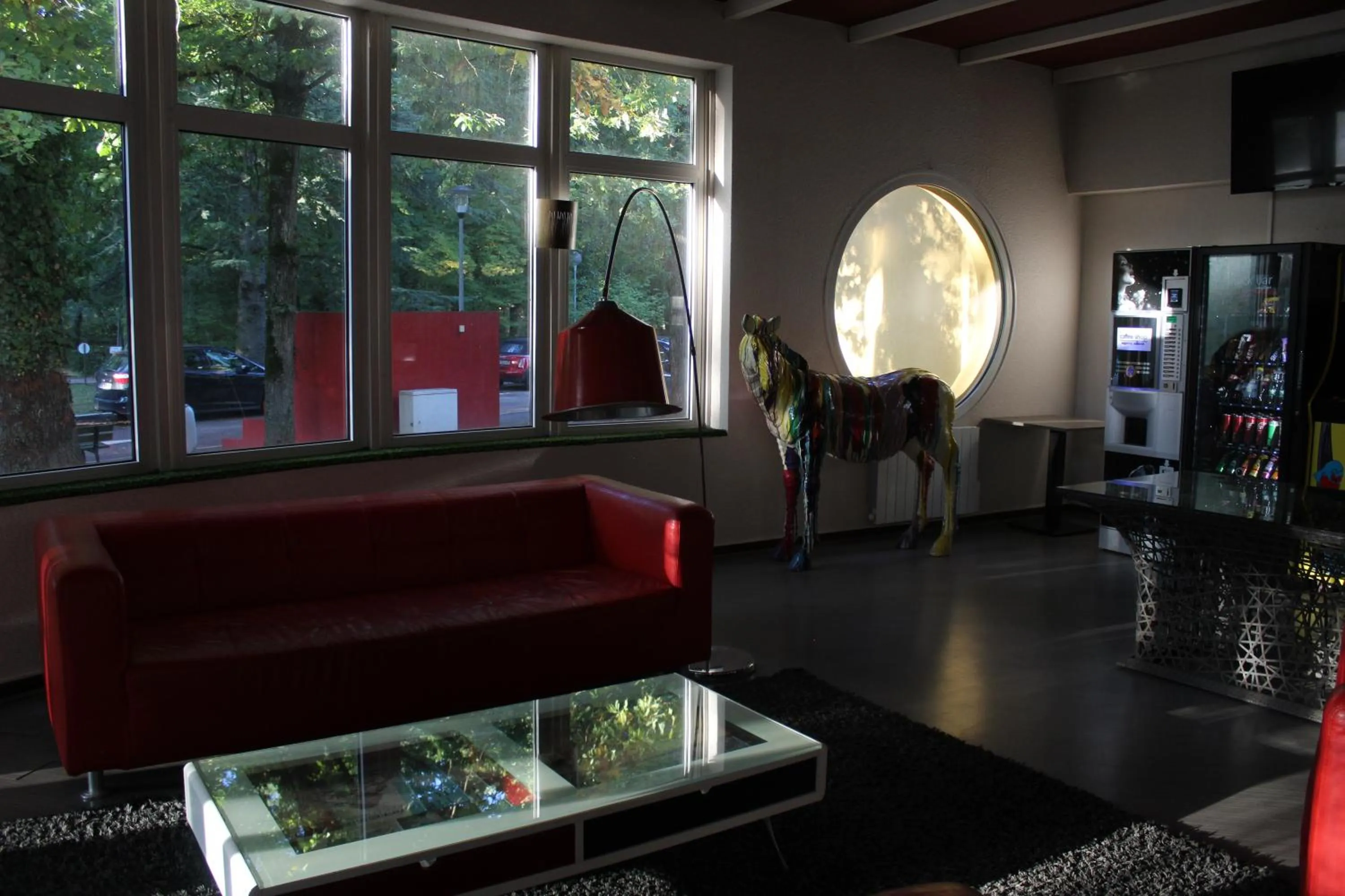 Living room in Enzo Hôtels Premier Prix - Logis Amnéville