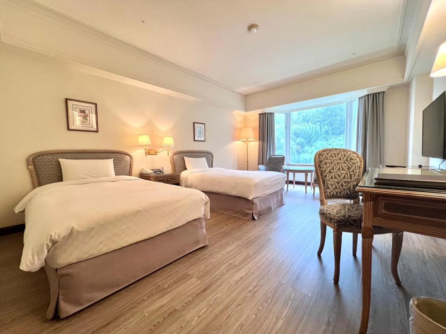 Photo of the whole room, Bed in Le Midi Hotel Chitou