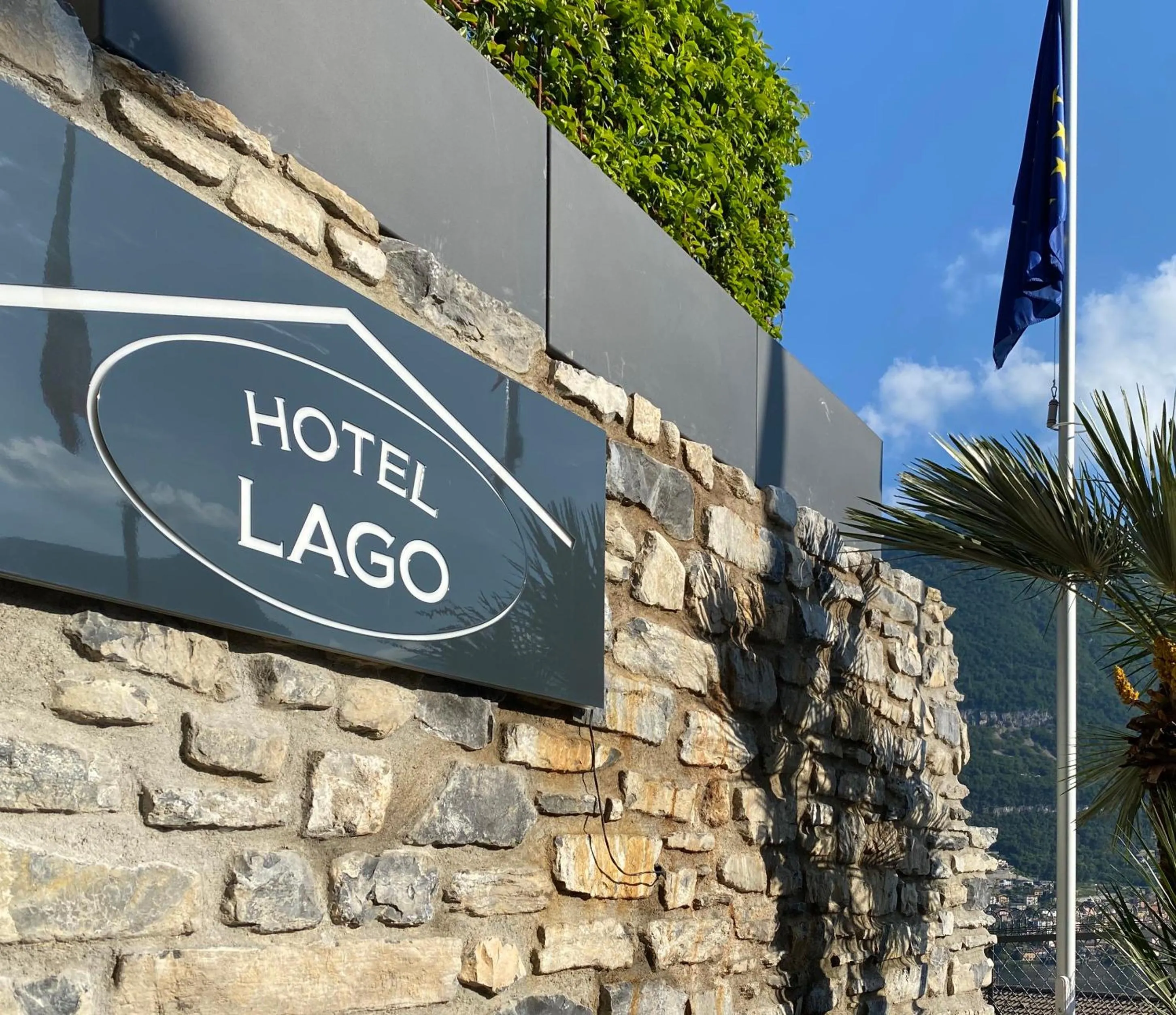 Property logo or sign in Hotel Lago