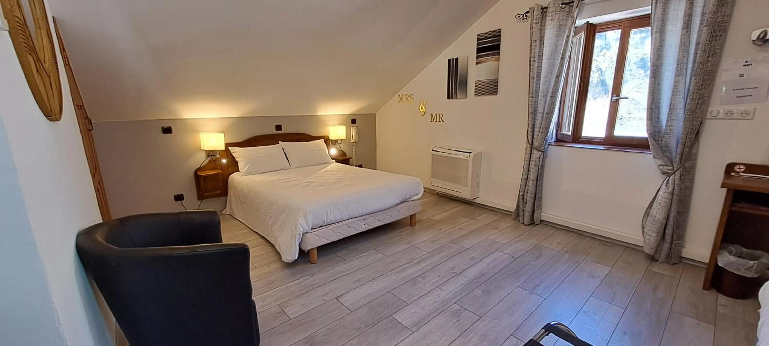 Bedroom, Bed in Logis Hôtel restaurant Auberge de la Cascade