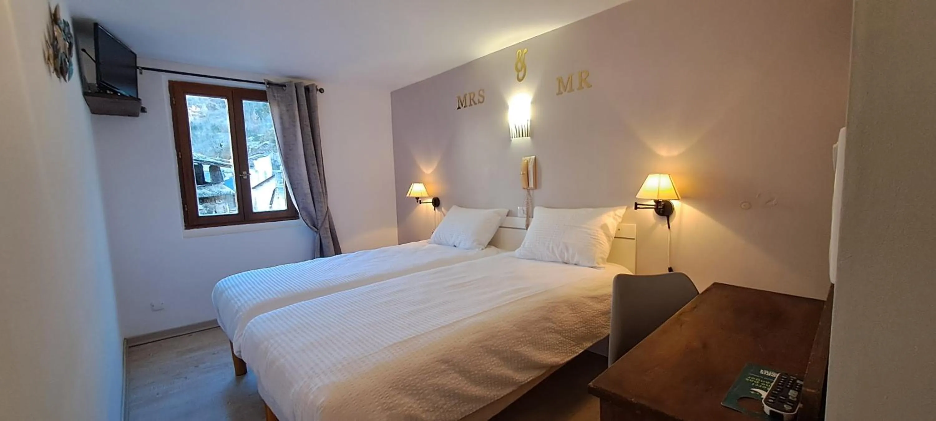 Bedroom, Bed in Logis Hôtel restaurant Auberge de la Cascade