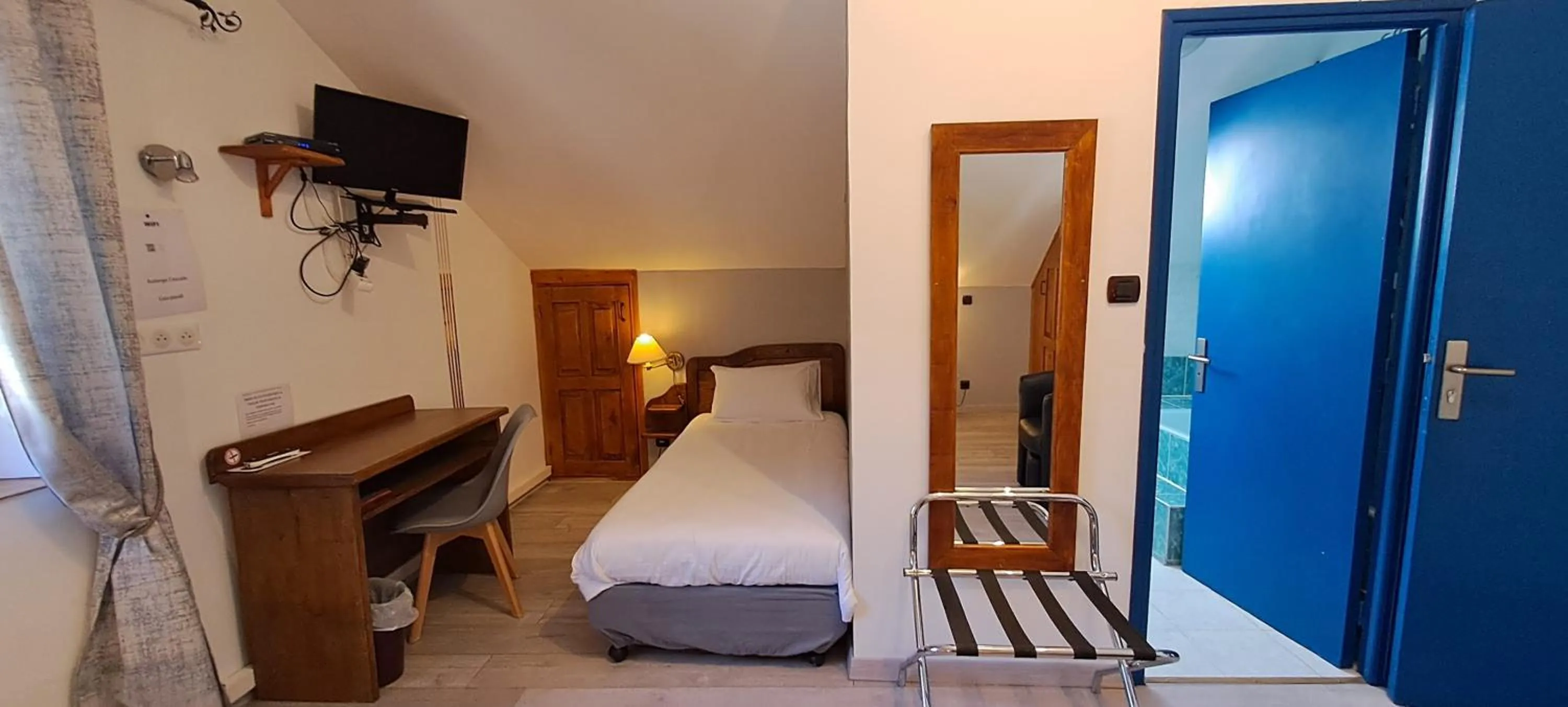 Bedroom, Bed in Logis Hôtel restaurant Auberge de la Cascade