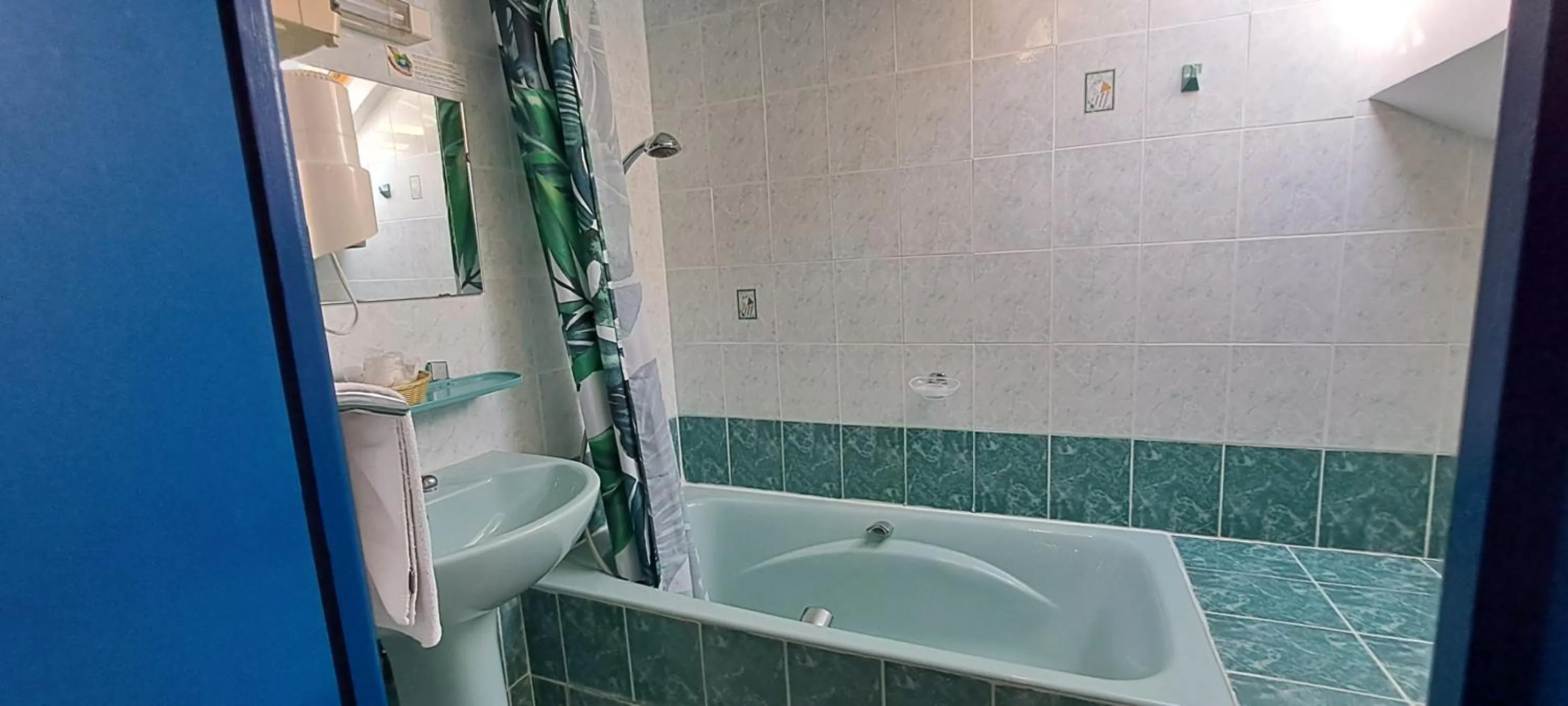 Bathroom in Logis Hôtel restaurant Auberge de la Cascade