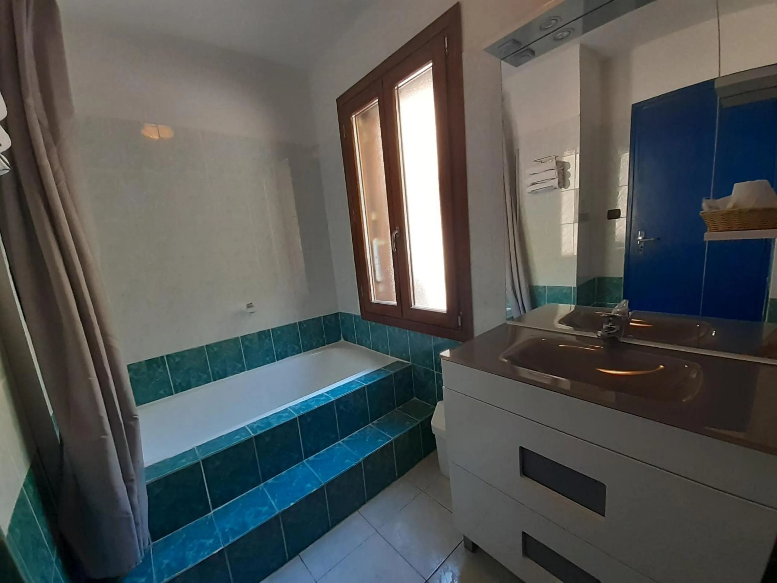 Bathroom in Logis Hôtel restaurant Auberge de la Cascade