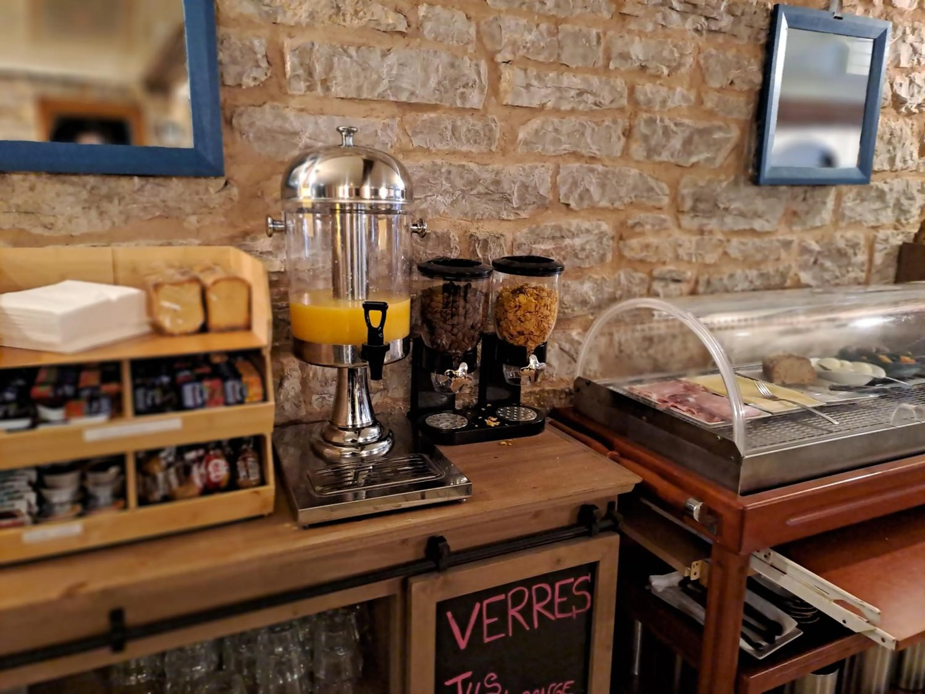 Buffet breakfast in Logis Hôtel restaurant Auberge de la Cascade