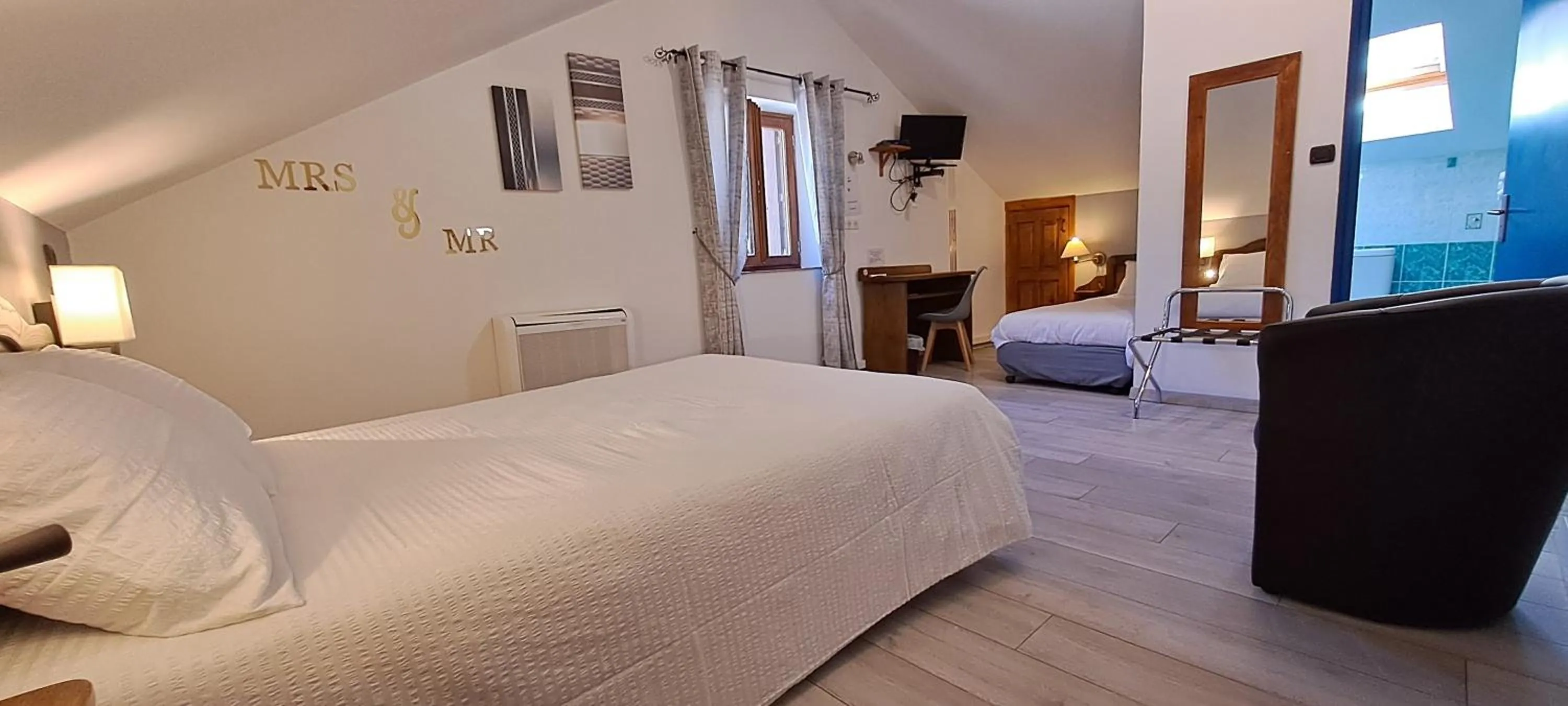 Bedroom, Bed in Logis Hôtel restaurant Auberge de la Cascade