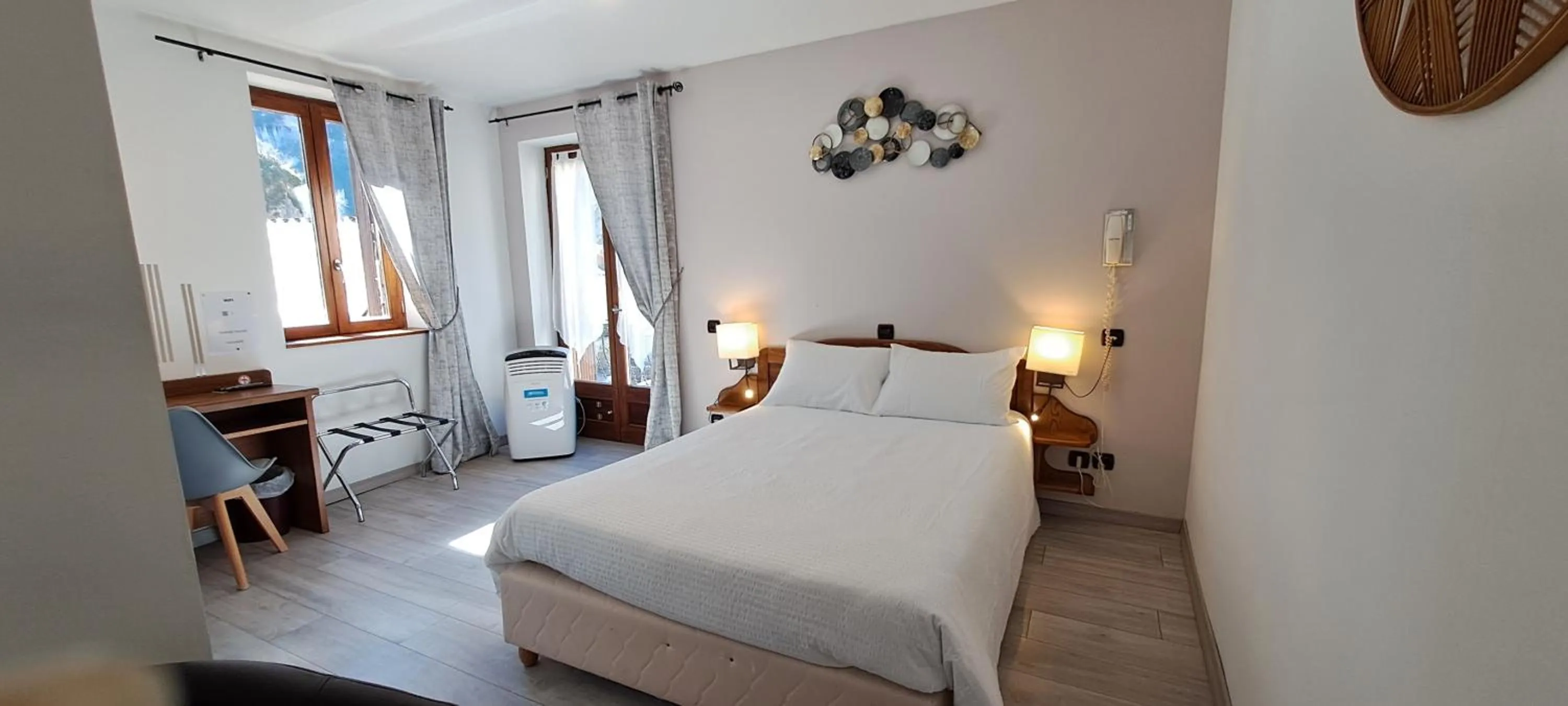 Bedroom, Bed in Logis Hôtel restaurant Auberge de la Cascade