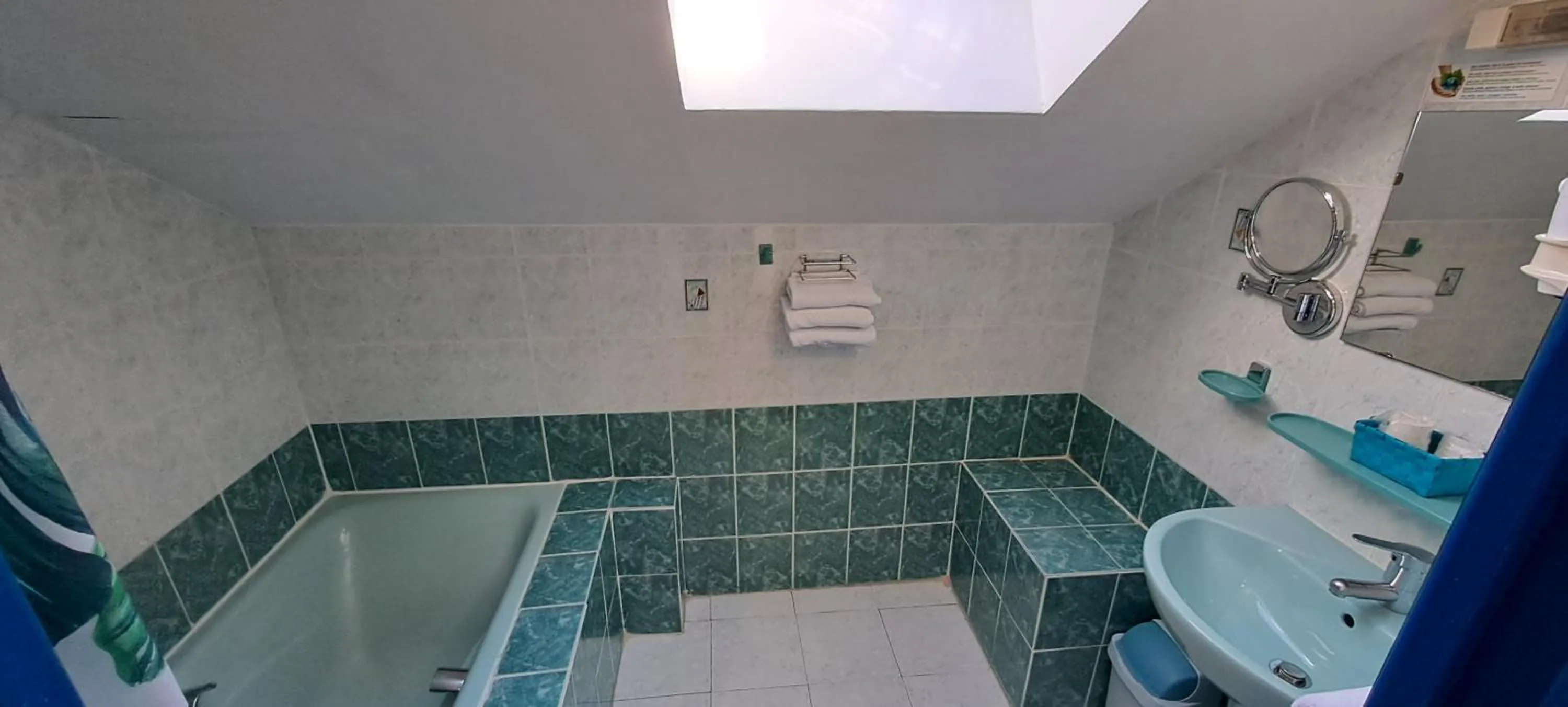 Bathroom in Logis Hôtel restaurant Auberge de la Cascade