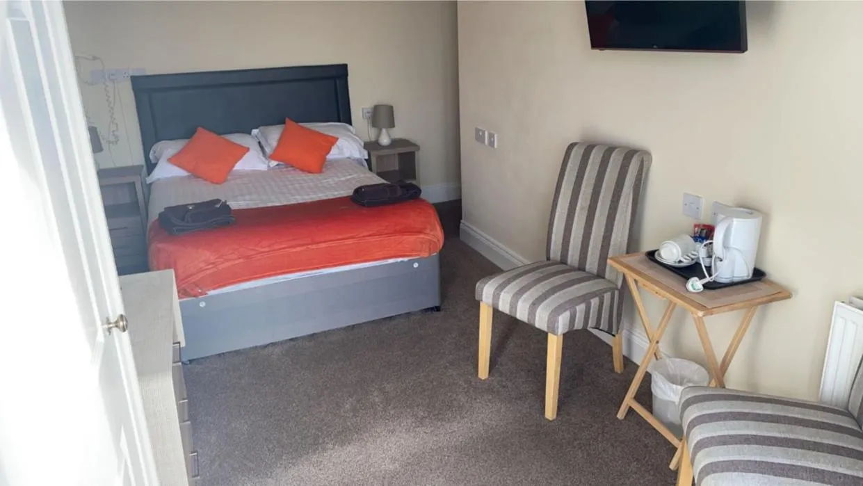 Bed in Royal Grosvenor Hotel