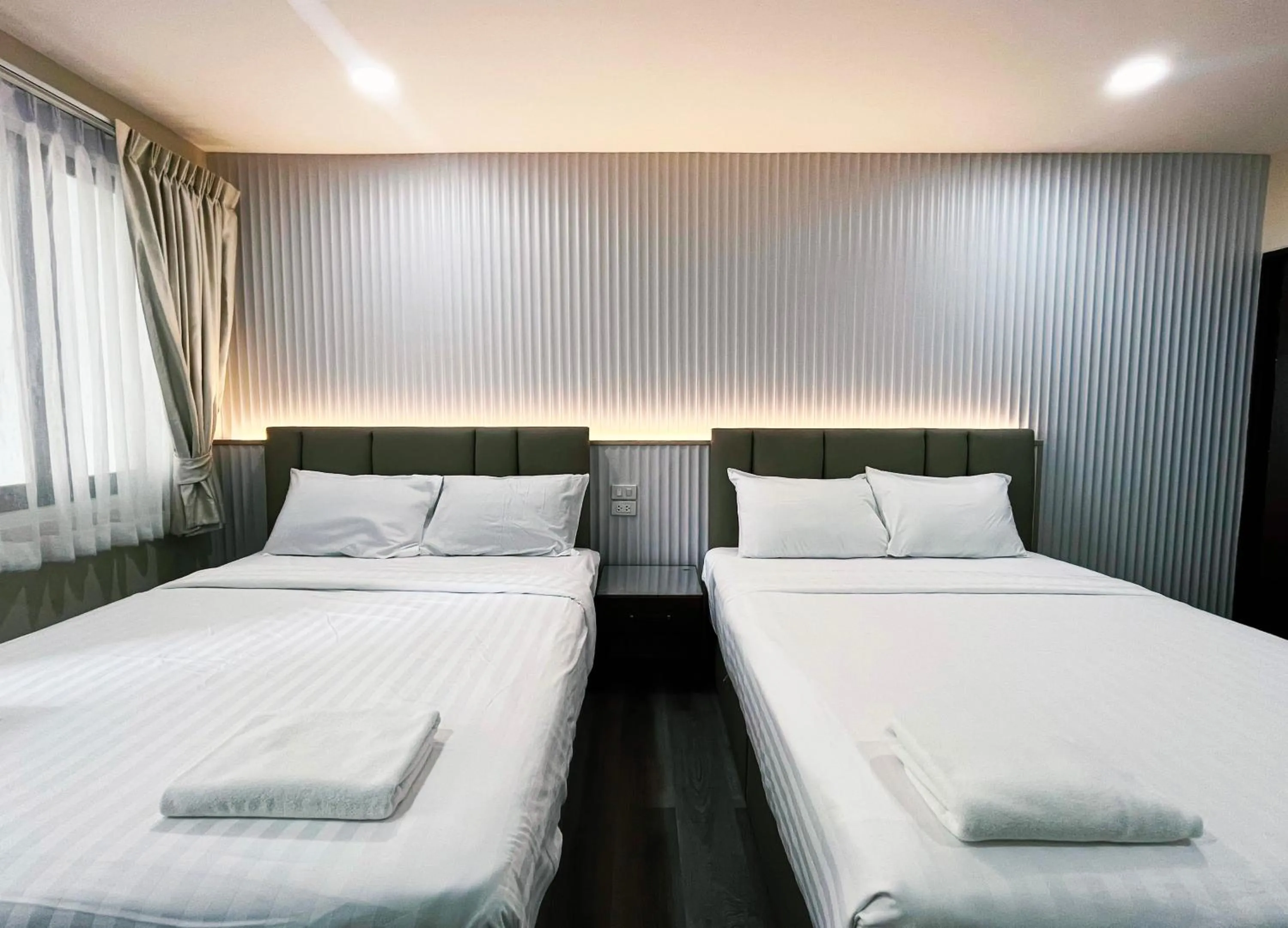 Bed in Excel Hotel Bangkok former Sri Krungthep Hotel