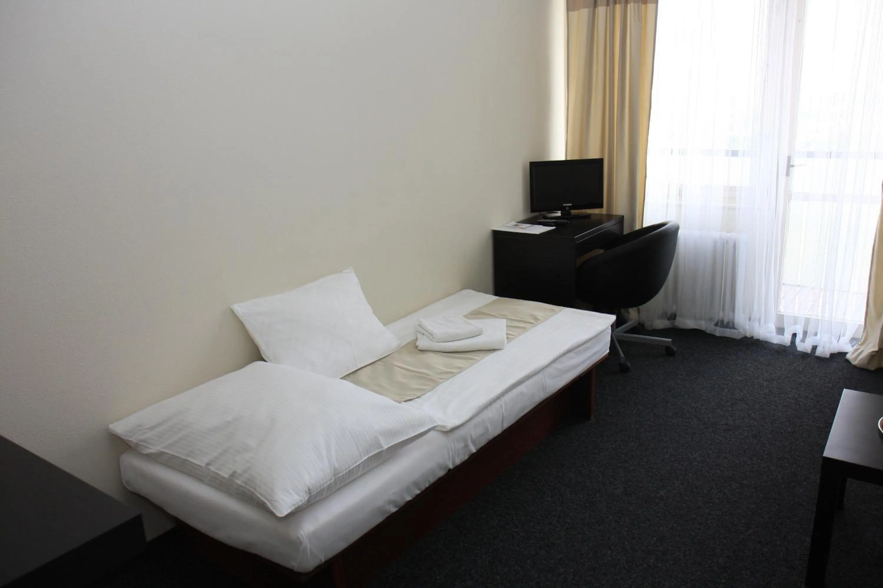 Bed in Hotel Kladno