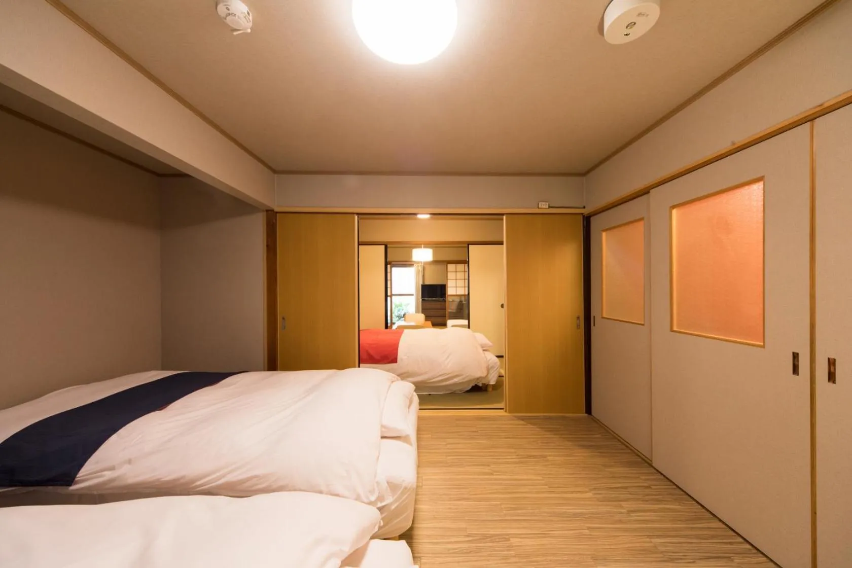 Bed in 京町家 懿造 -Kyomachiya IZO-