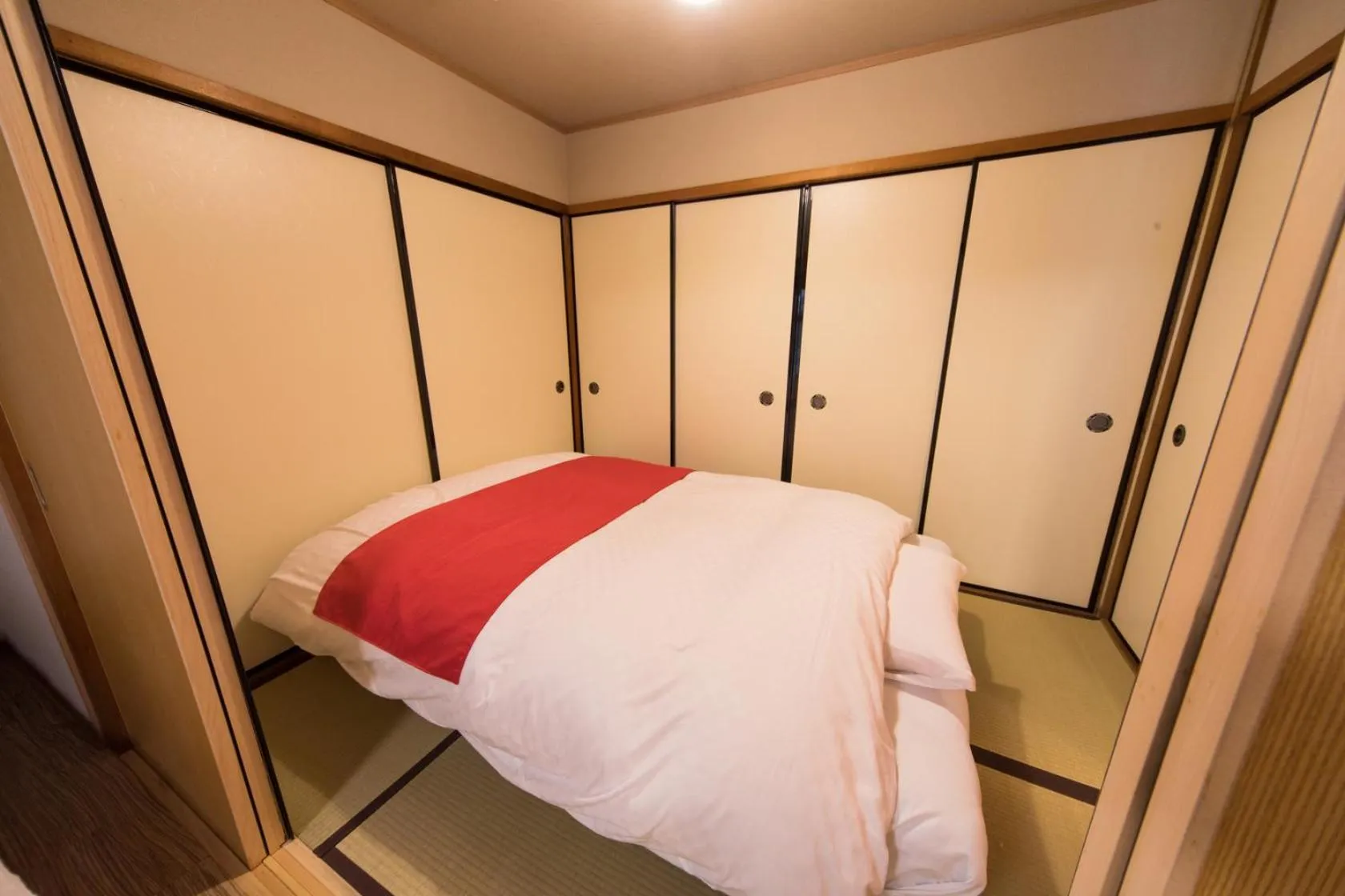 Bed in 京町家 懿造 -Kyomachiya IZO-