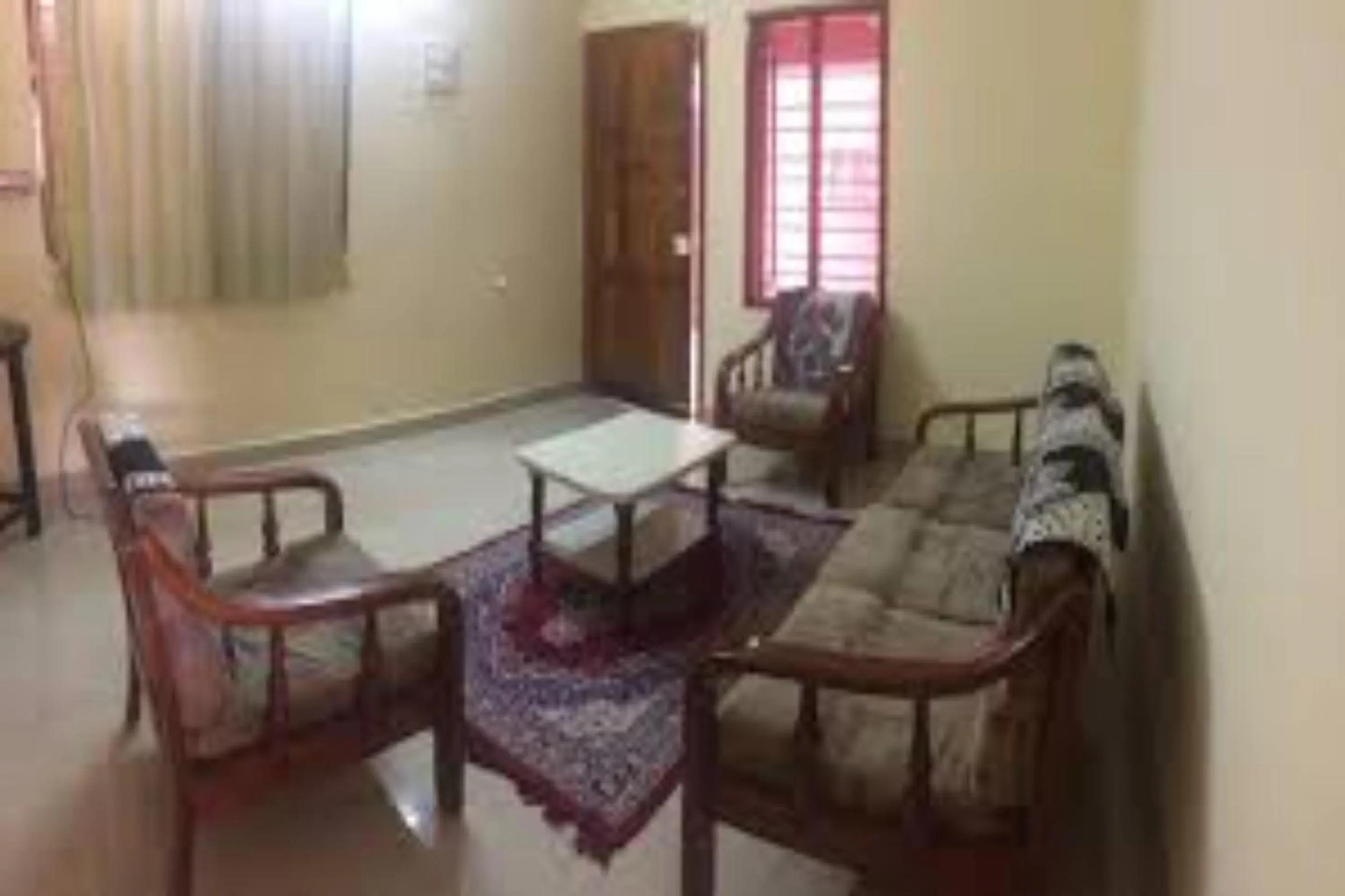 Seating area, Bed in Charisma Residence Syariah